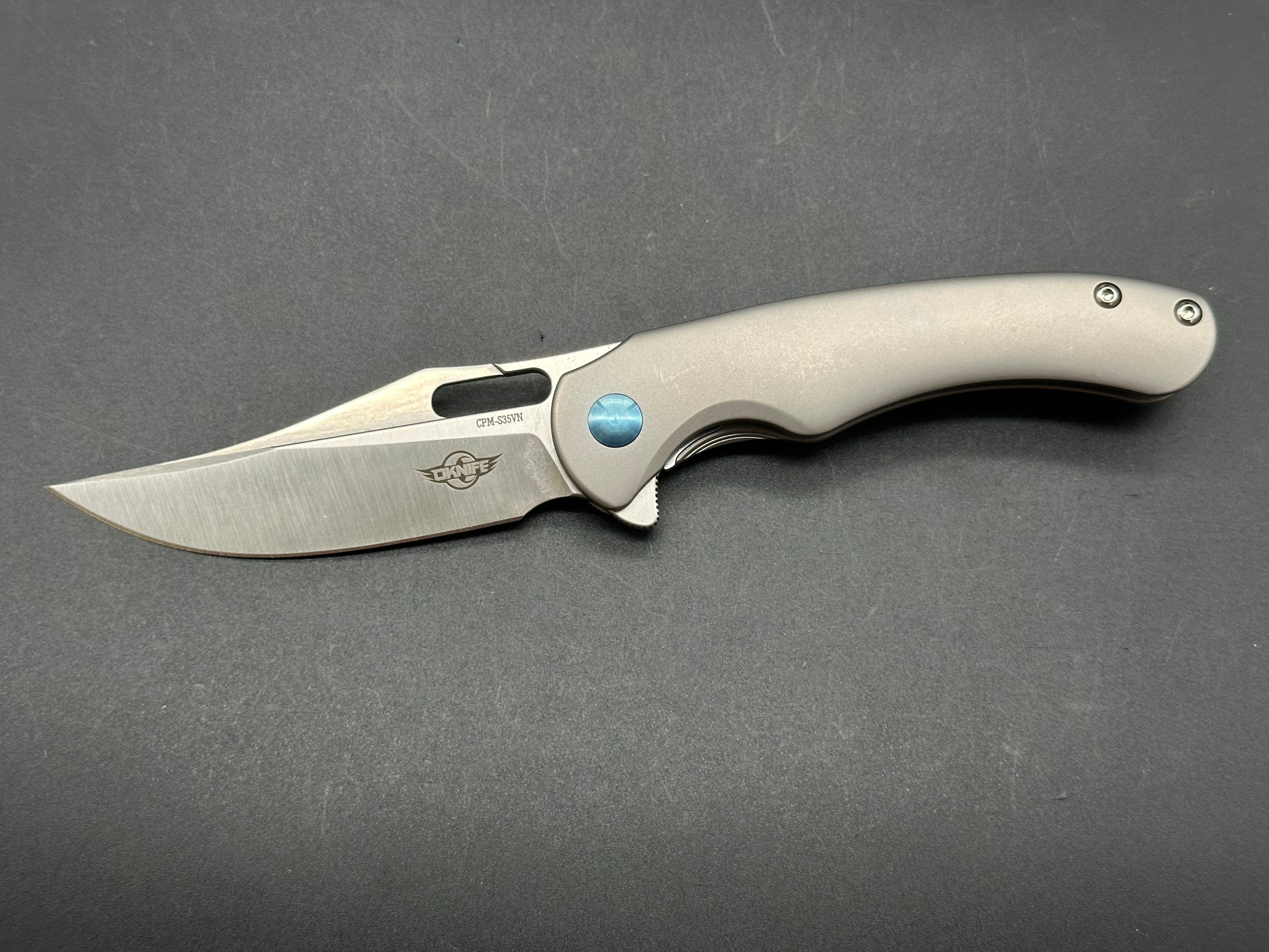 OLIGHT OKNIFE SPLINT FOLDING KNIFE TITANIUM HANDLE CMP-S35VN