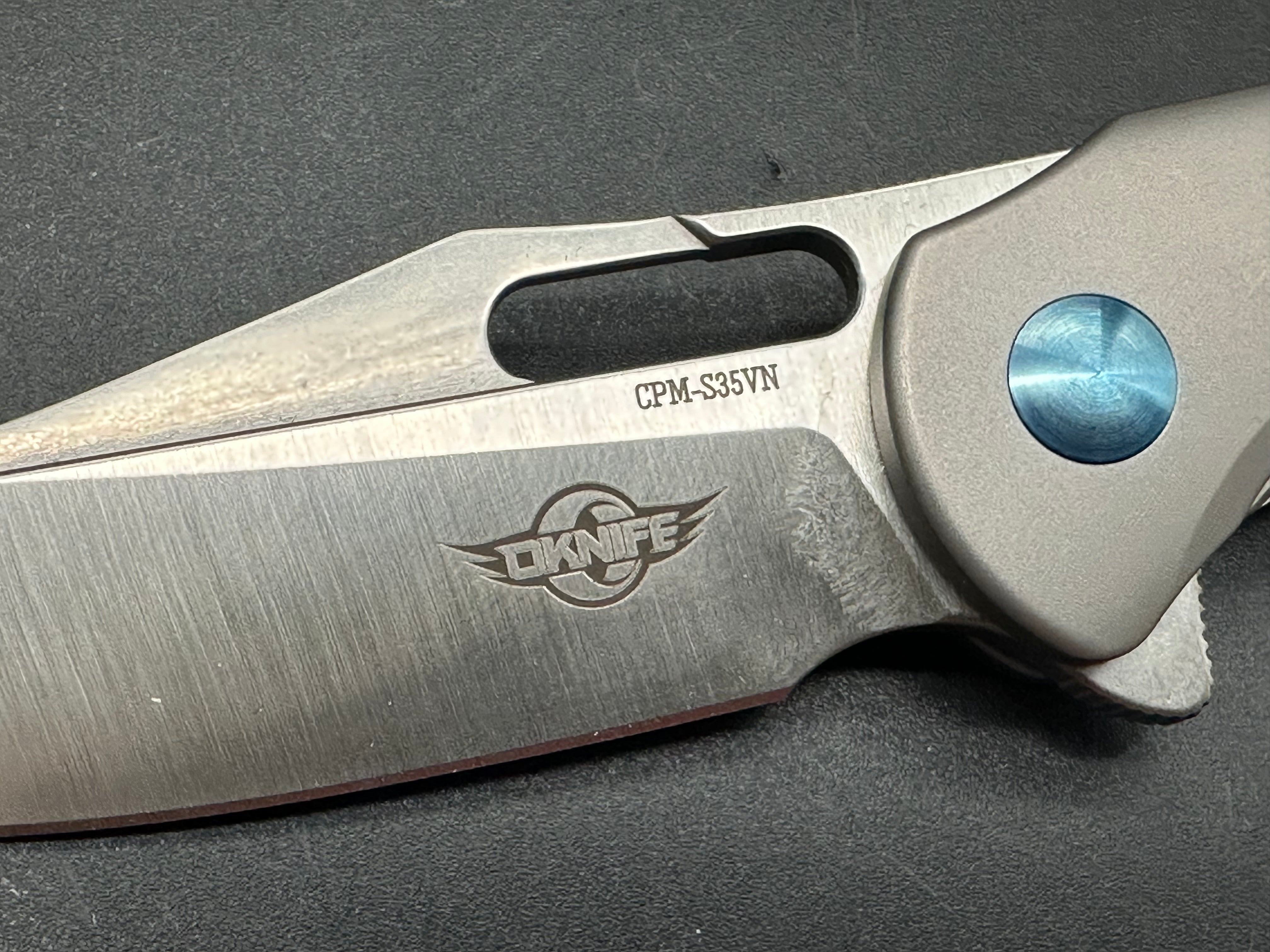 OLIGHT OKNIFE SPLINT FOLDING KNIFE TITANIUM HANDLE CMP-S35VN