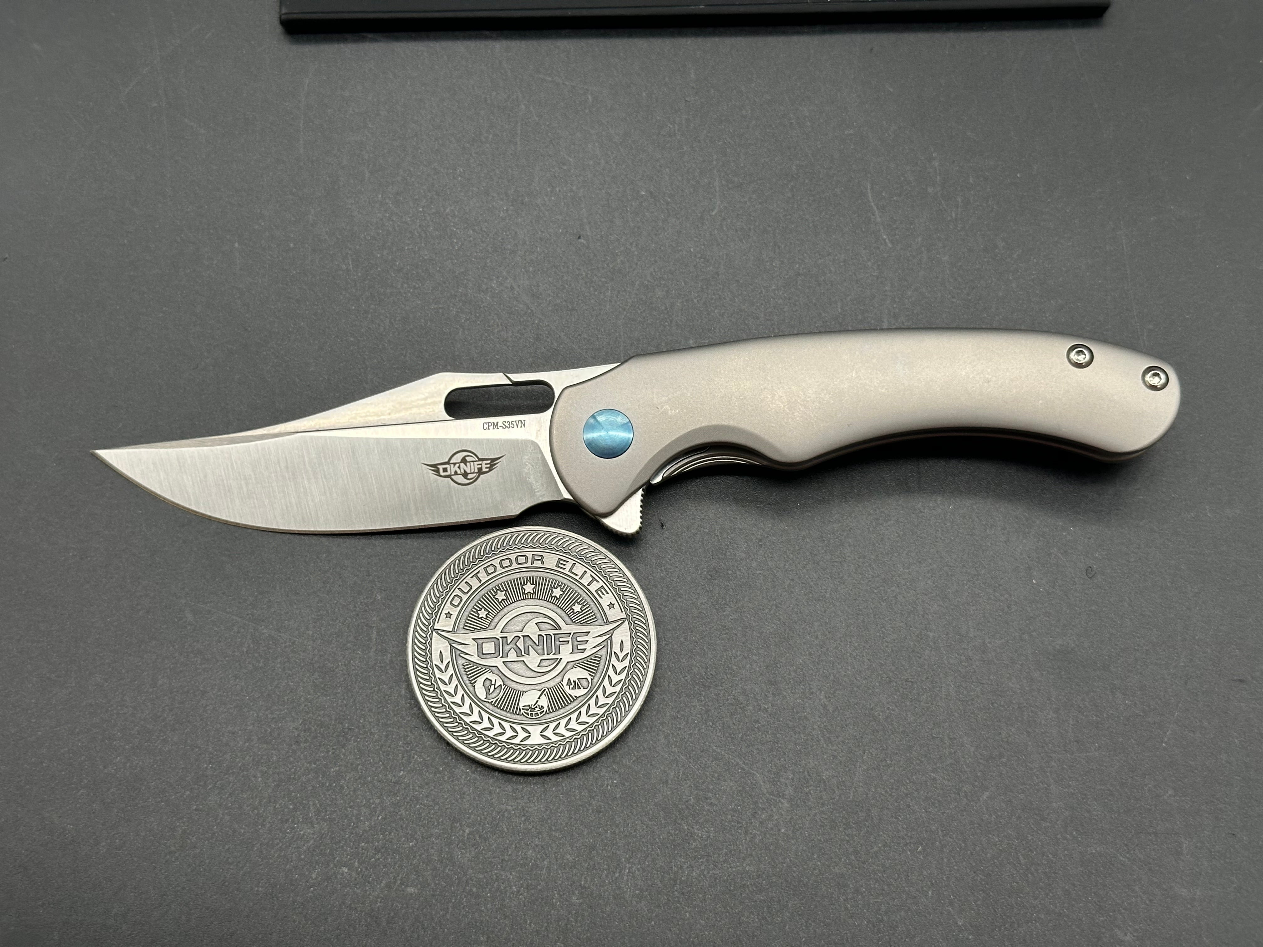 OLIGHT OKNIFE SPLINT FOLDING KNIFE TITANIUM HANDLE CMP-S35VN
