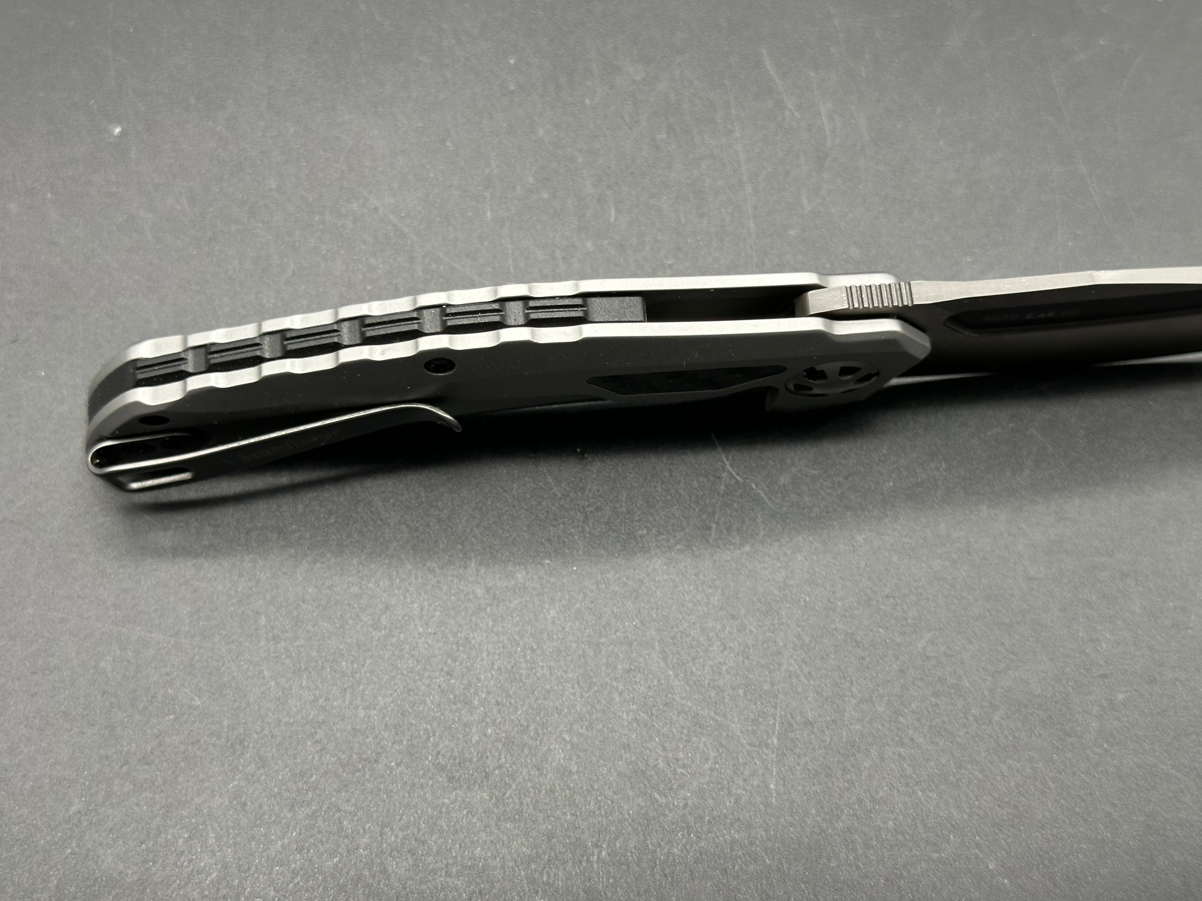 KERSHAW NORAD FRAME LOCK FLIPPER KNIFE STAINLESS W/ CF HANDLE PLAIN D2 BLADE