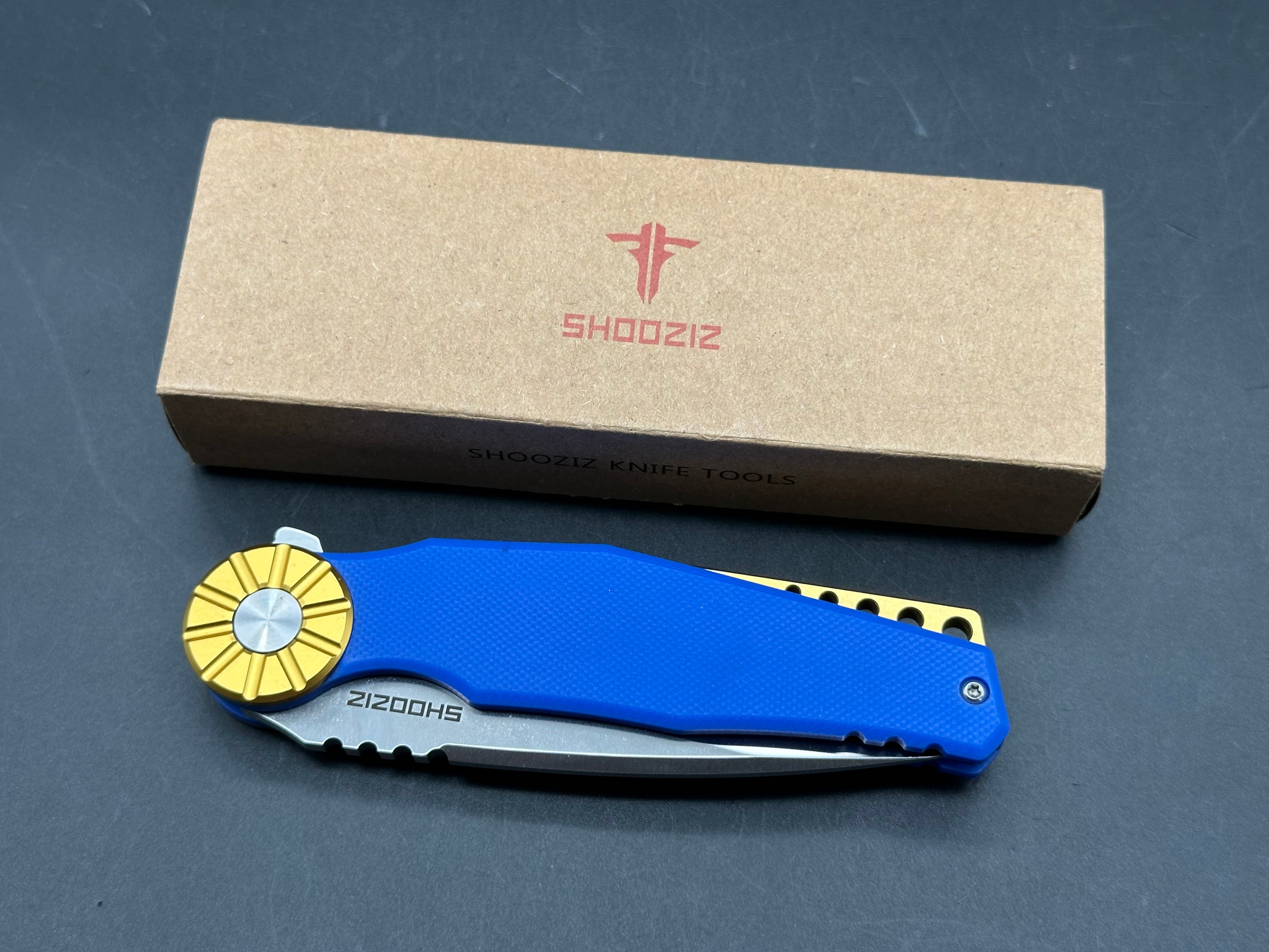 Shooziz Kila DC53 Steel, Aluminum Bolster, Blue G10 Handle