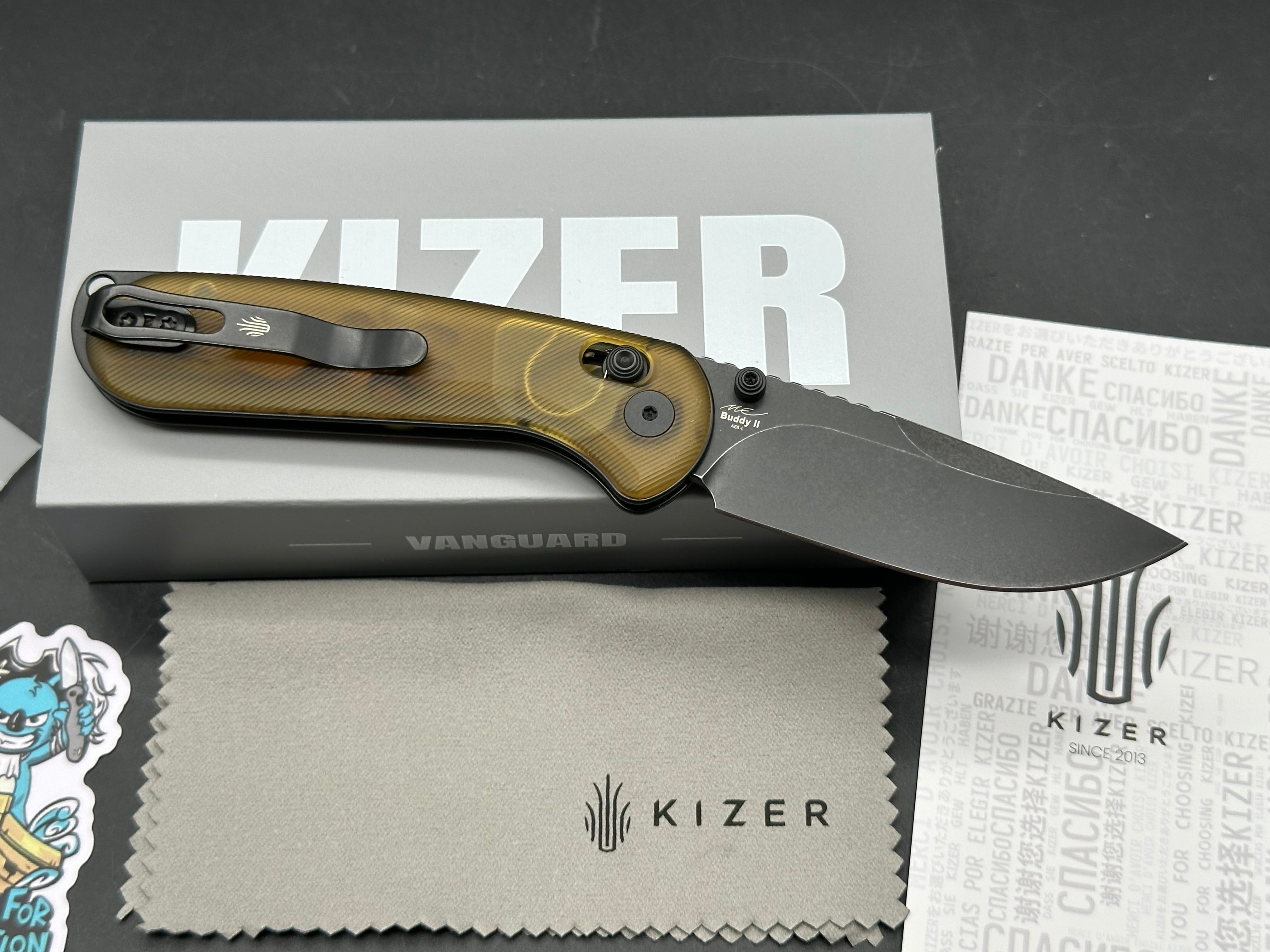 KIZER BUDDY II FOLDING KNIFE YELLOW PEI HANDLE AEB-L DROP POINT PLAIN EDGE BLACK PVD STONEWASH FINISH