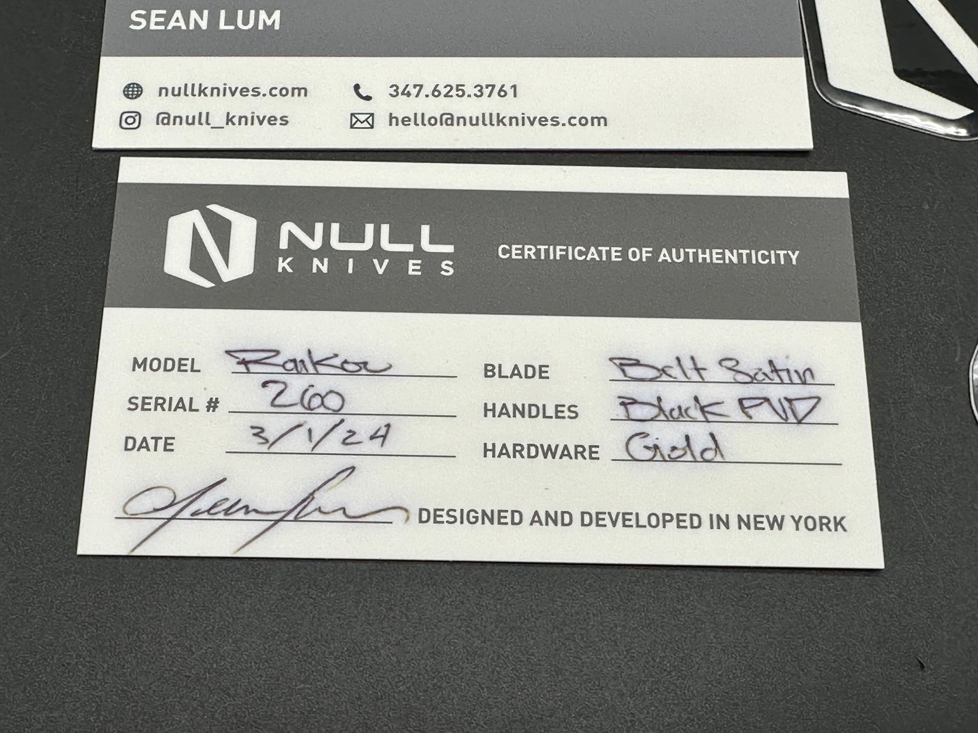 Null Knives Raikou w/black PVD titanium scales with gold hardware and a satin finished S90V blade