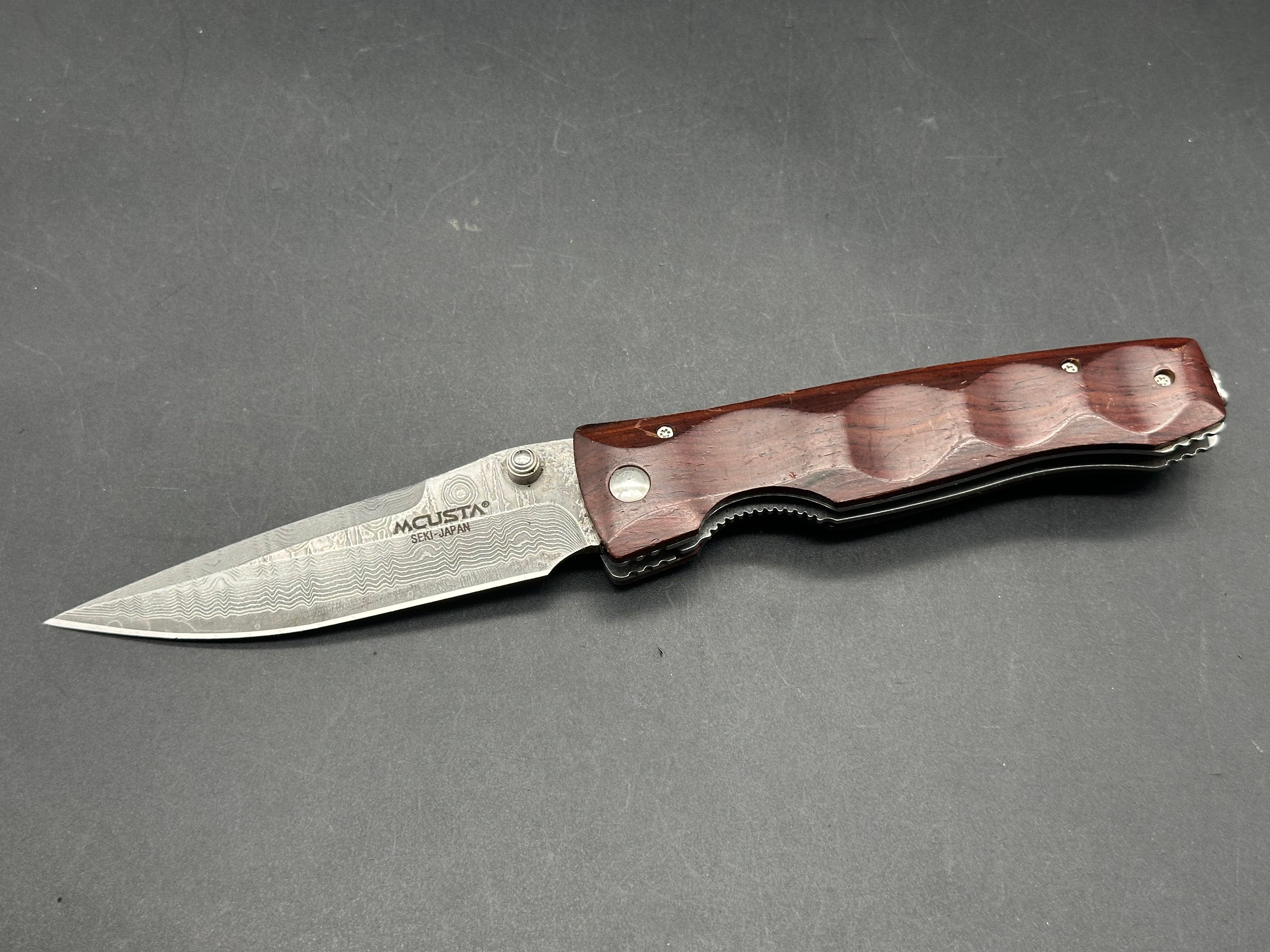 Mcusta Damascus folding knife
