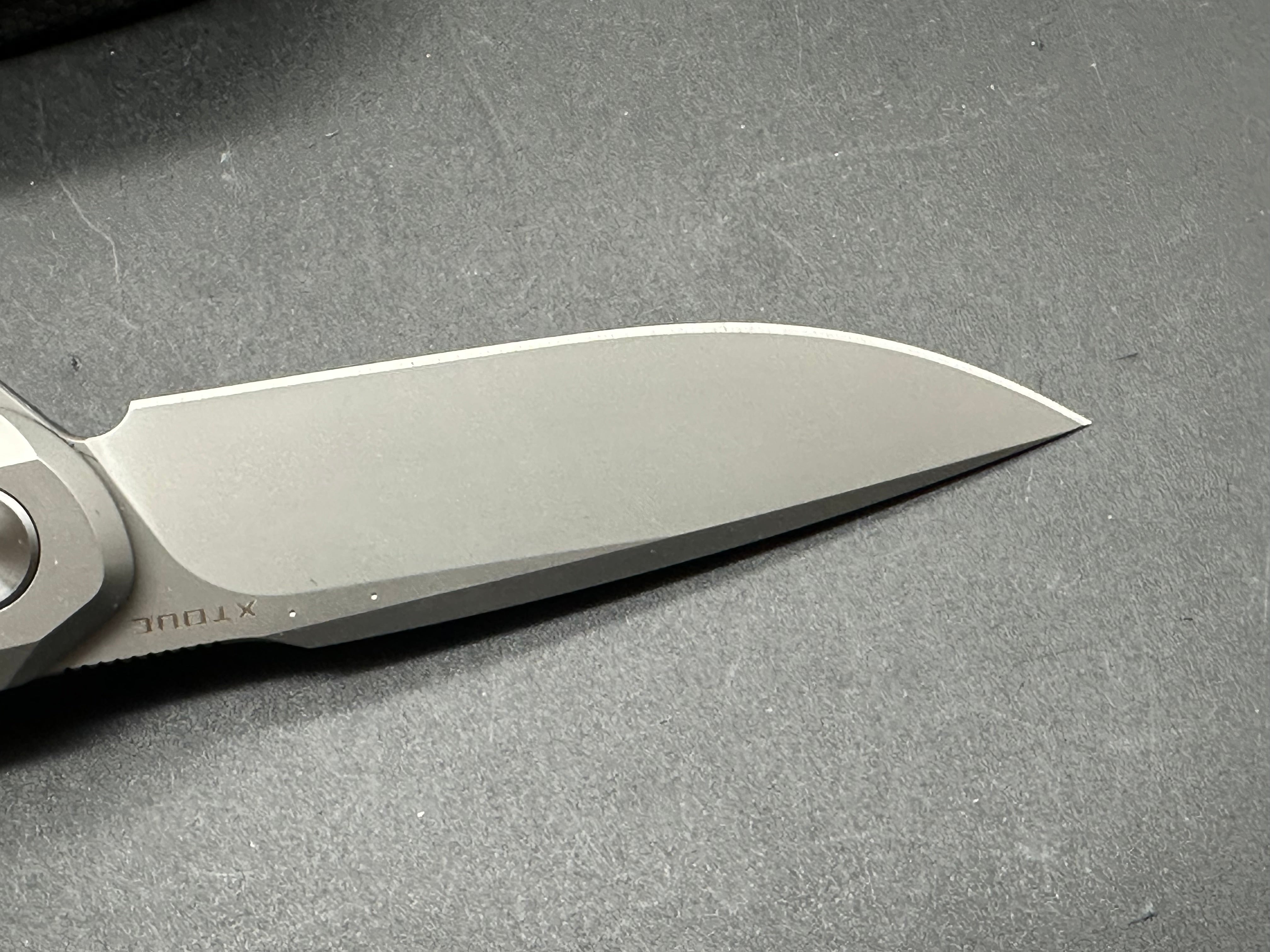 XTOUC RX302 titanium handle w/M390 blade