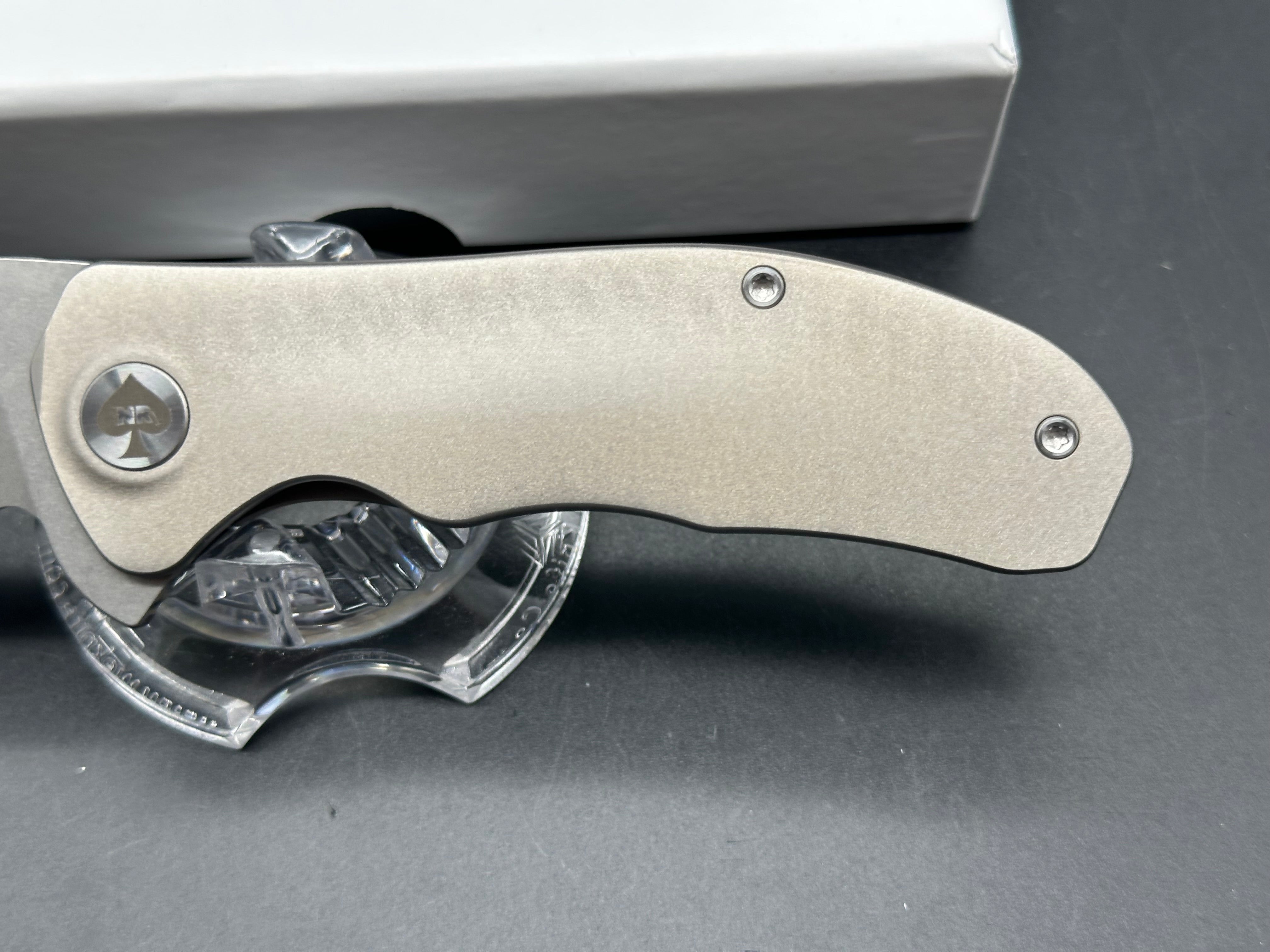 NRiggi Knives "JERSEY" Laser Engraved Wave Titanium Scales w/CPM 20CV bead blast blade