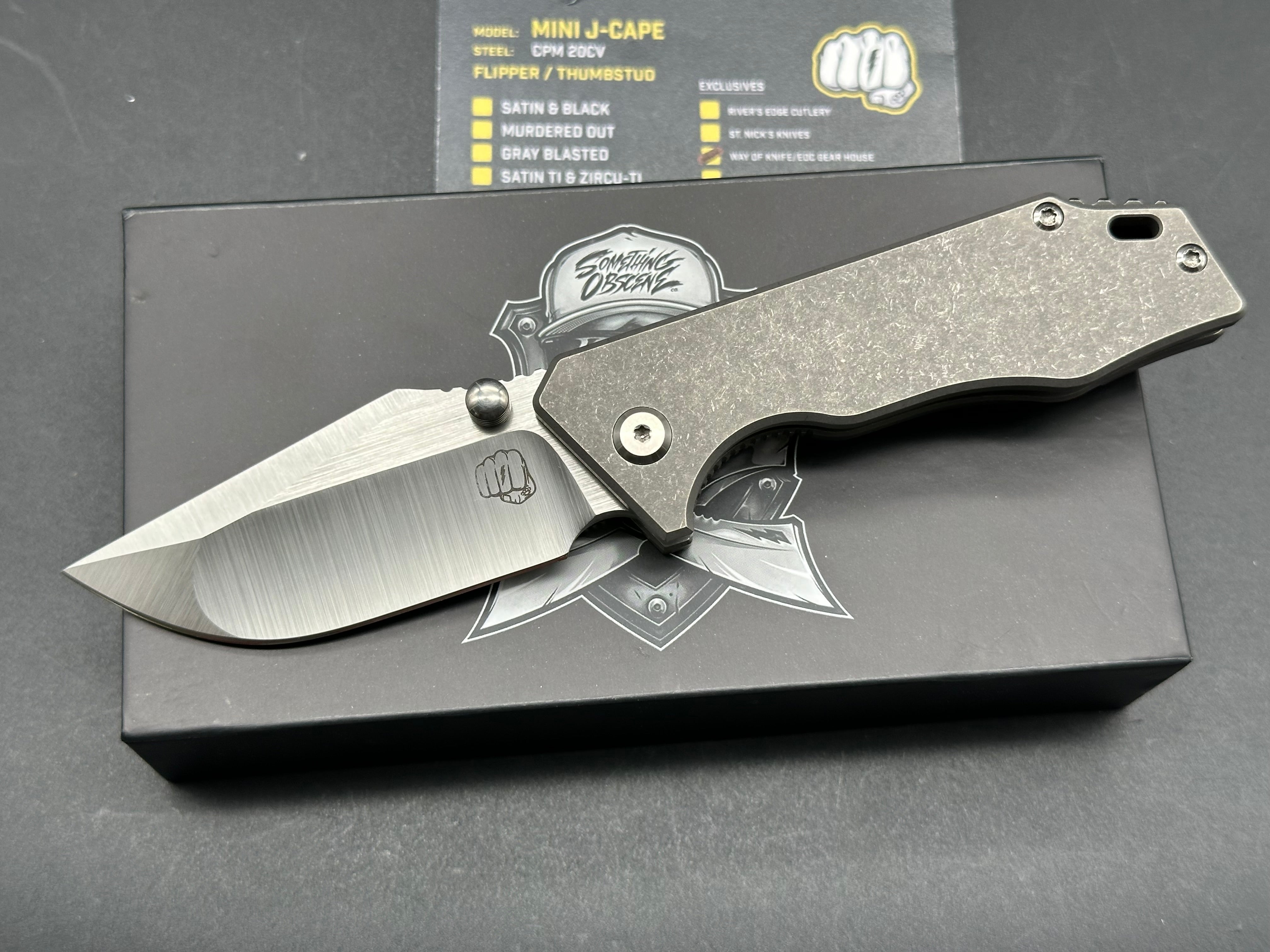 Something Obscene Mini J Cape Thumbstud Black / Satin Blade