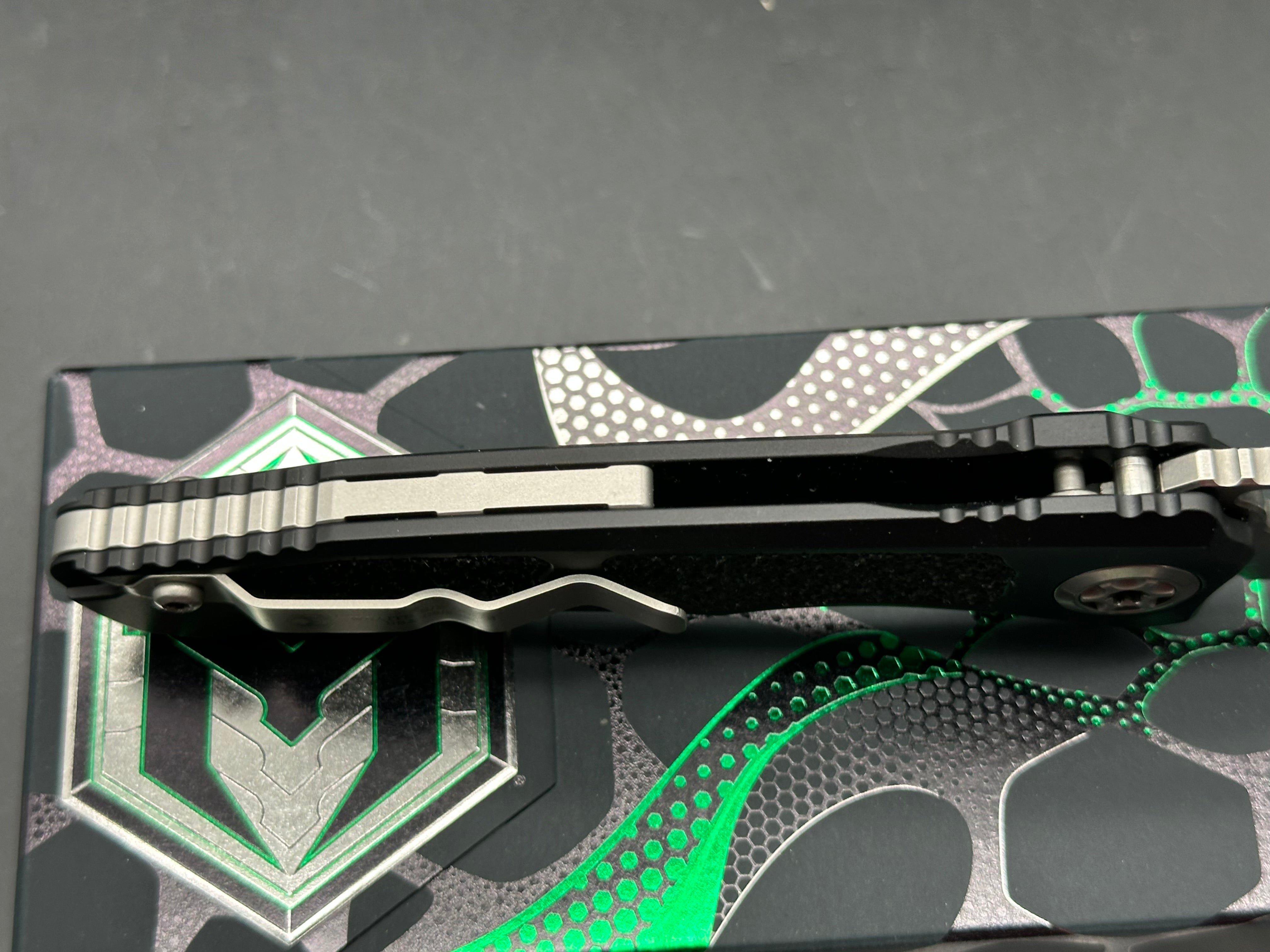 Heretic Wraith V4 Manual 3.625" CPM MagnaCut Stonewash Blade with Black Aluminum - Grip Tape Textured Scales plus Skiff Bearings Installed