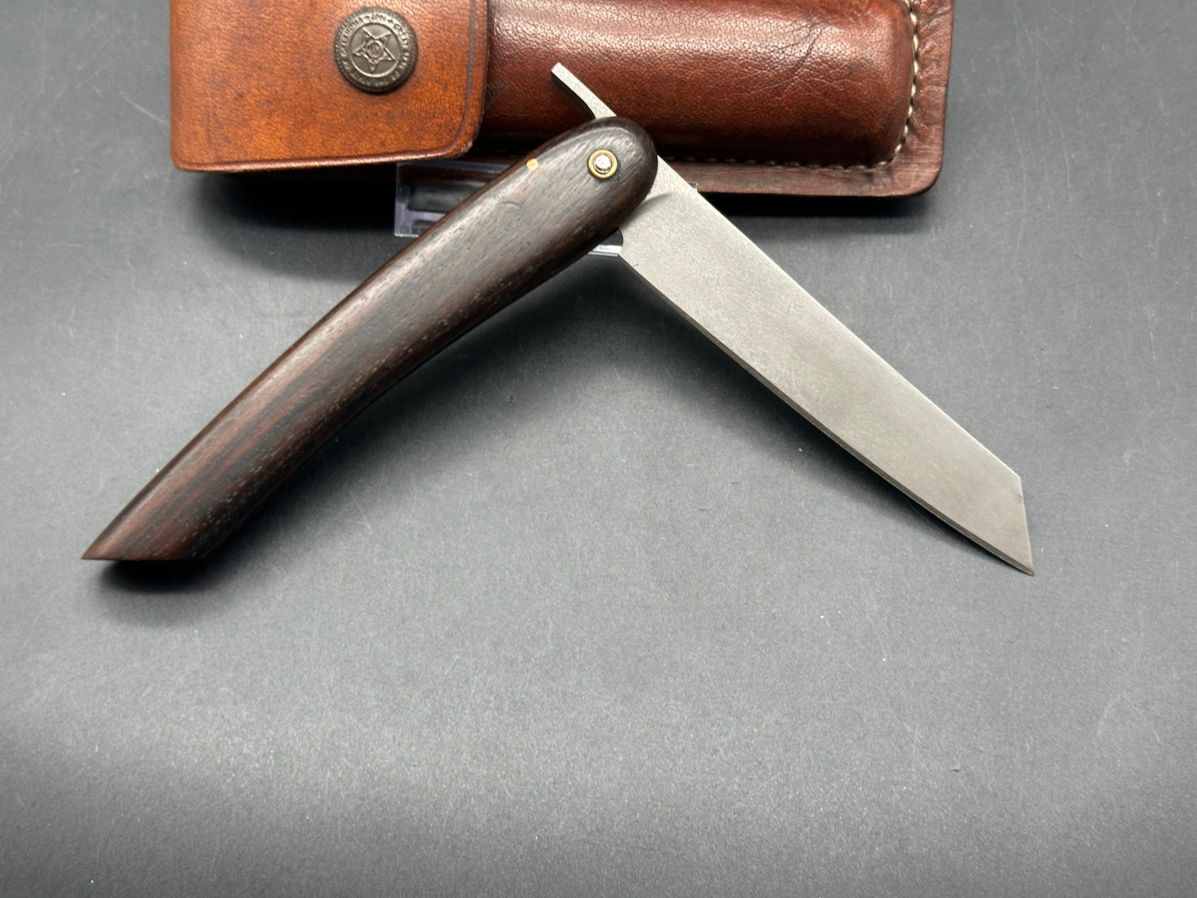 Younique Design “Friction Folder” Rosewood handle w/Wootz crucible steel blade