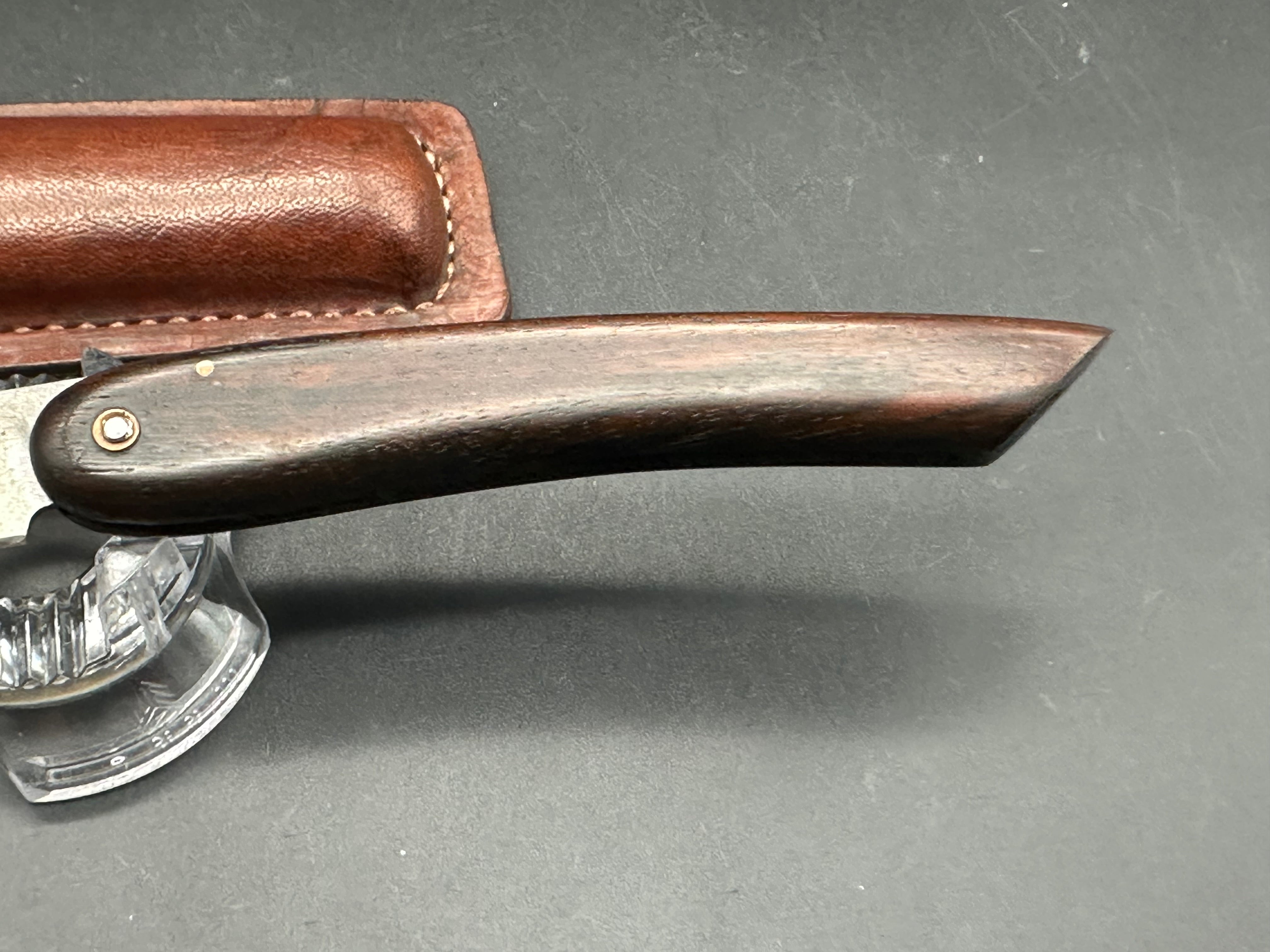 Younique Design “Friction Folder” Rosewood handle w/Wootz crucible steel blade