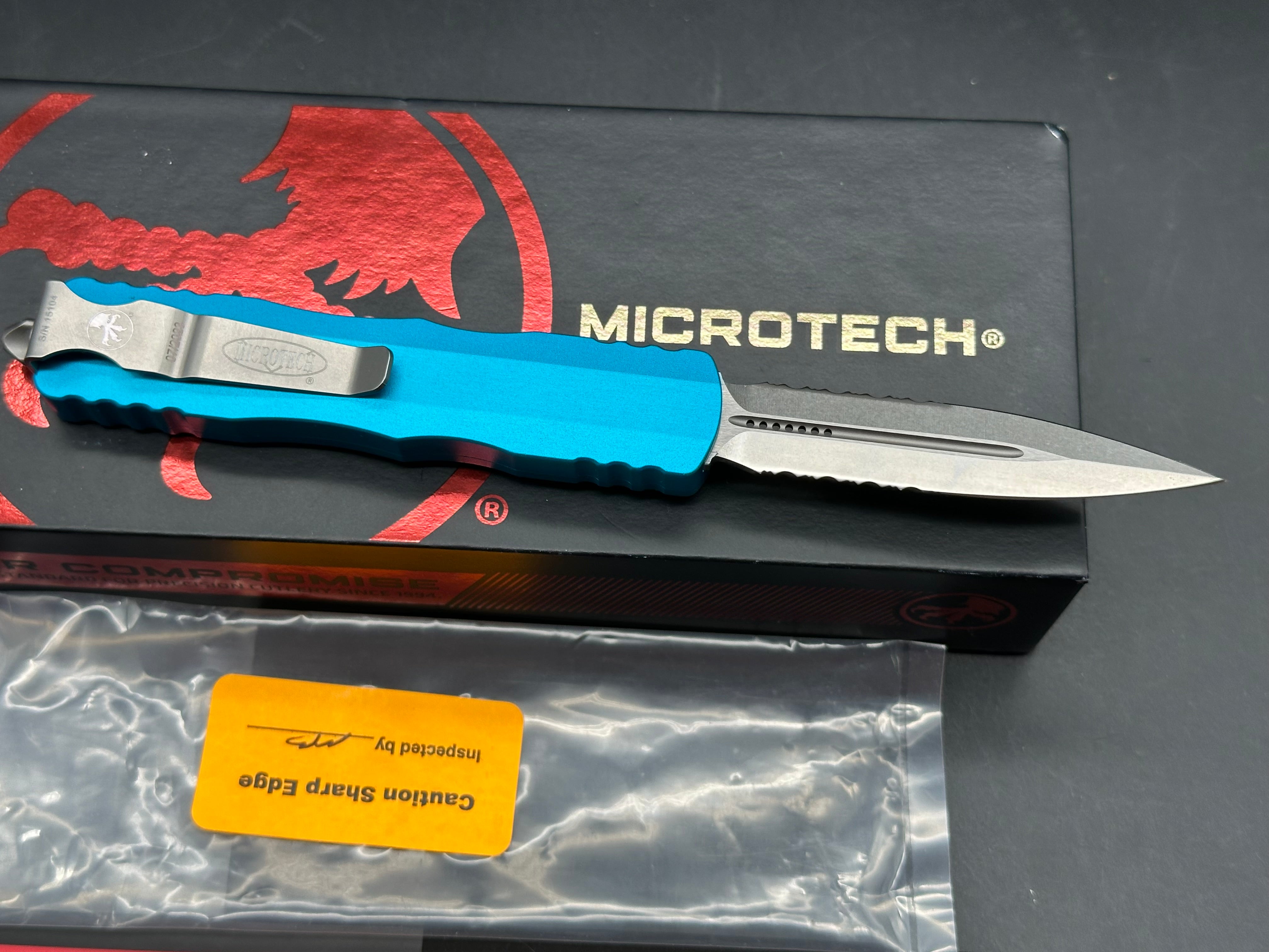 Microtech 225-11TQ Dirac AUTO OTF Knife 2.92" Stonewashed Double Combo Edge Dagger Blade, Turquoise Aluminum Handles