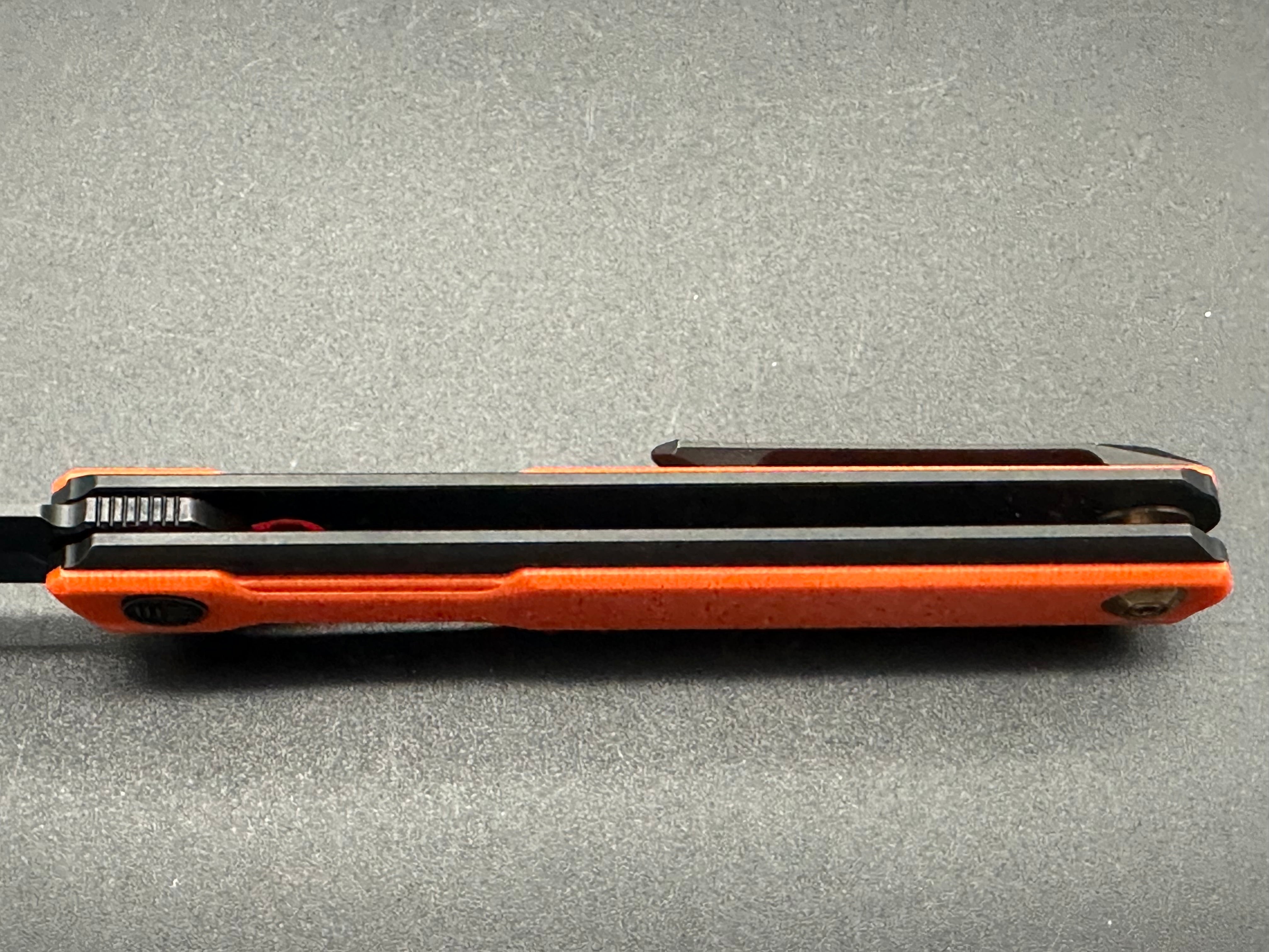 WE Peer 2015B Black Ti Handle with orange G10 overlay black 20CV blade
