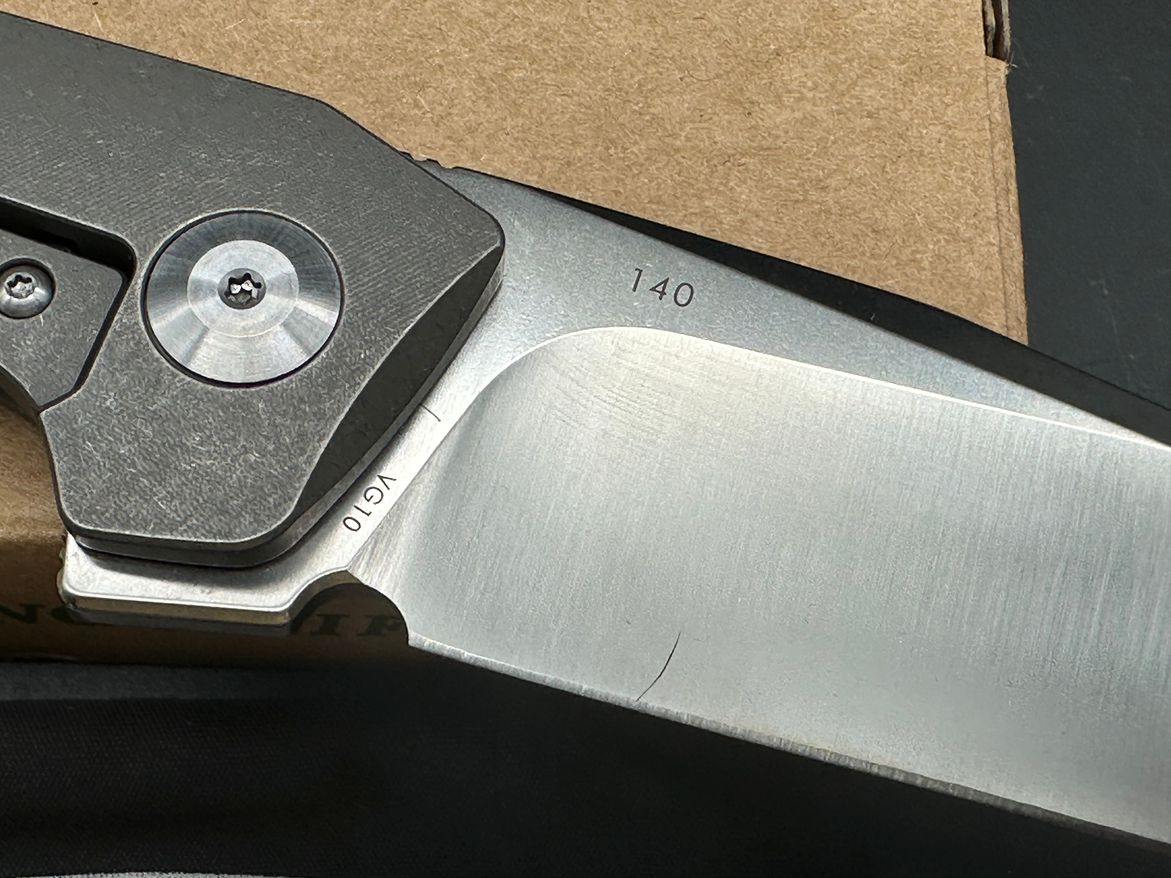 Land 140 titanium frame lock flipper w/VG10 blade