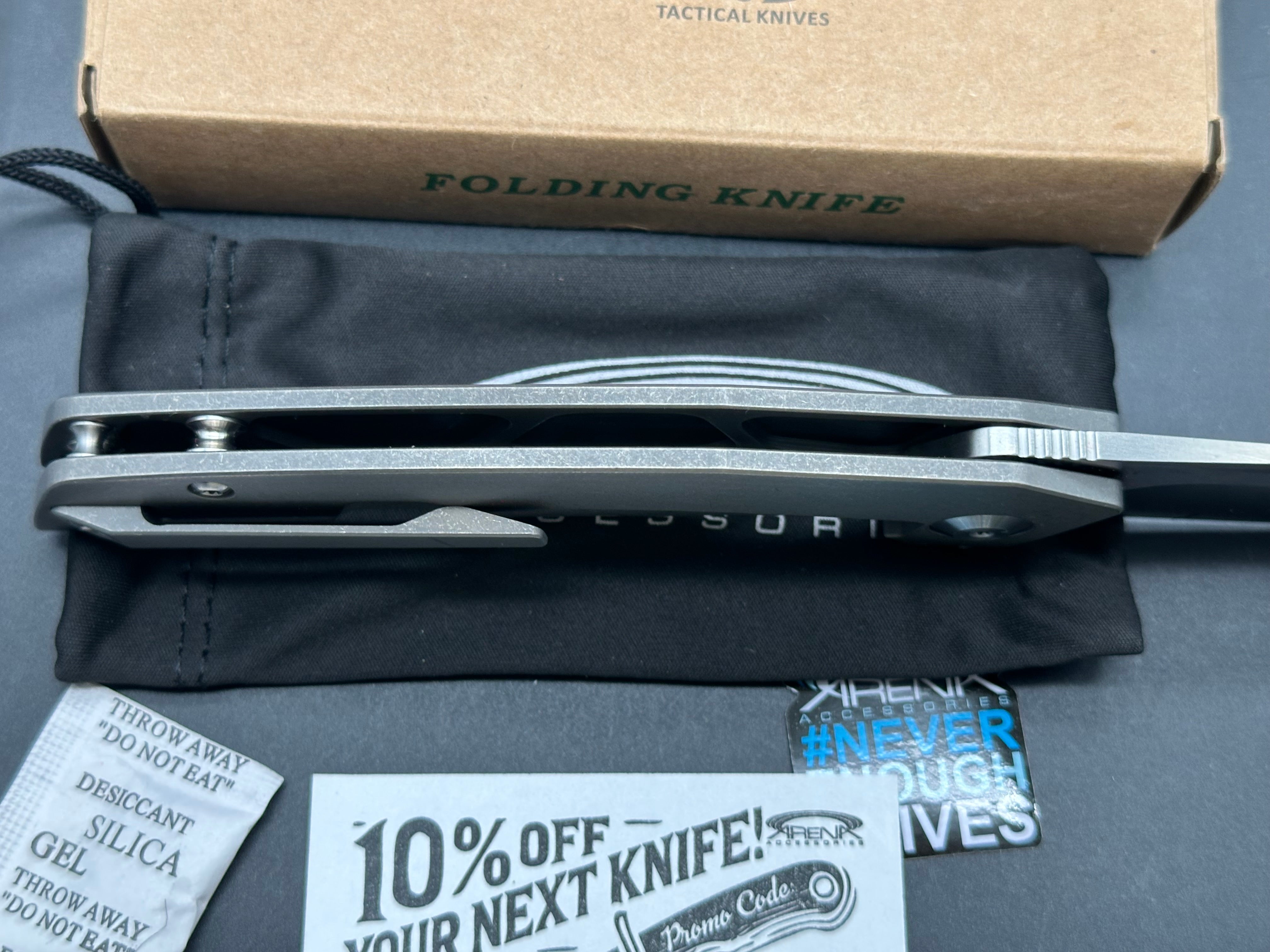 Land 140 titanium frame lock flipper w/VG10 blade