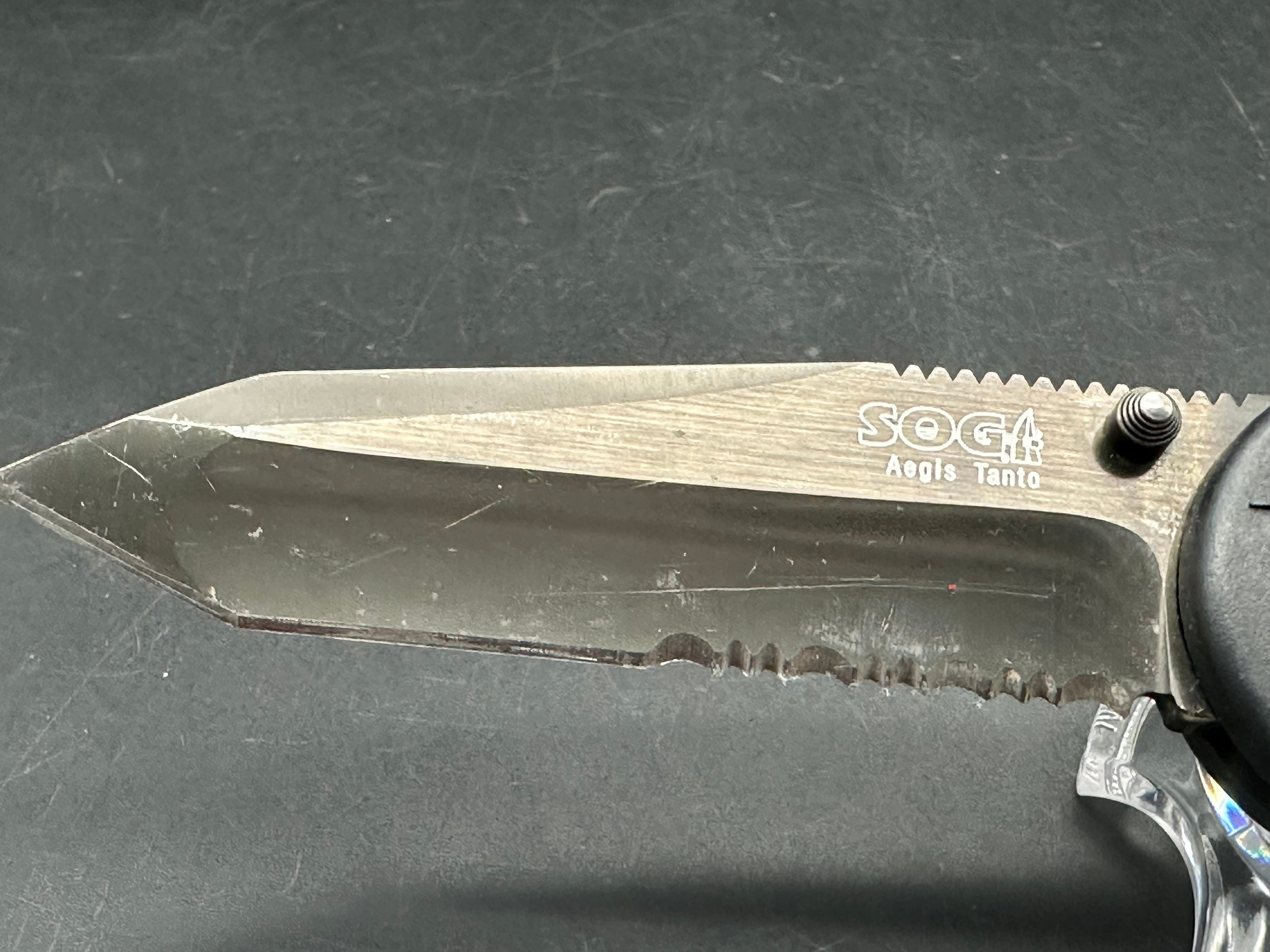 SOG Aegis Folding Knife Assisted 3.5" Black TiNi Combo Tanto Blade, Black GRN Handles, Arc-Lock