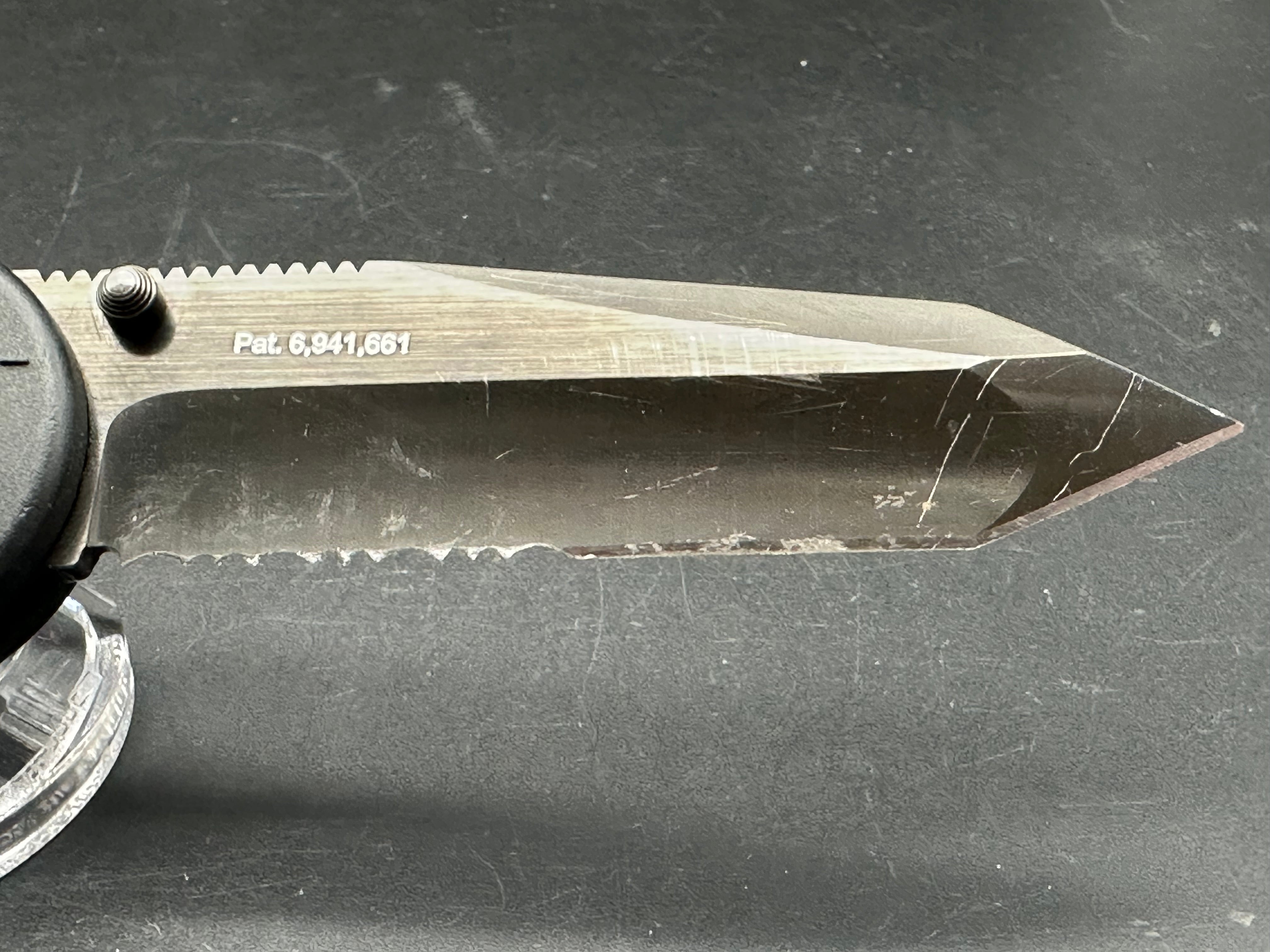 SOG Aegis Folding Knife Assisted 3.5" Black TiNi Combo Tanto Blade, Black GRN Handles, Arc-Lock