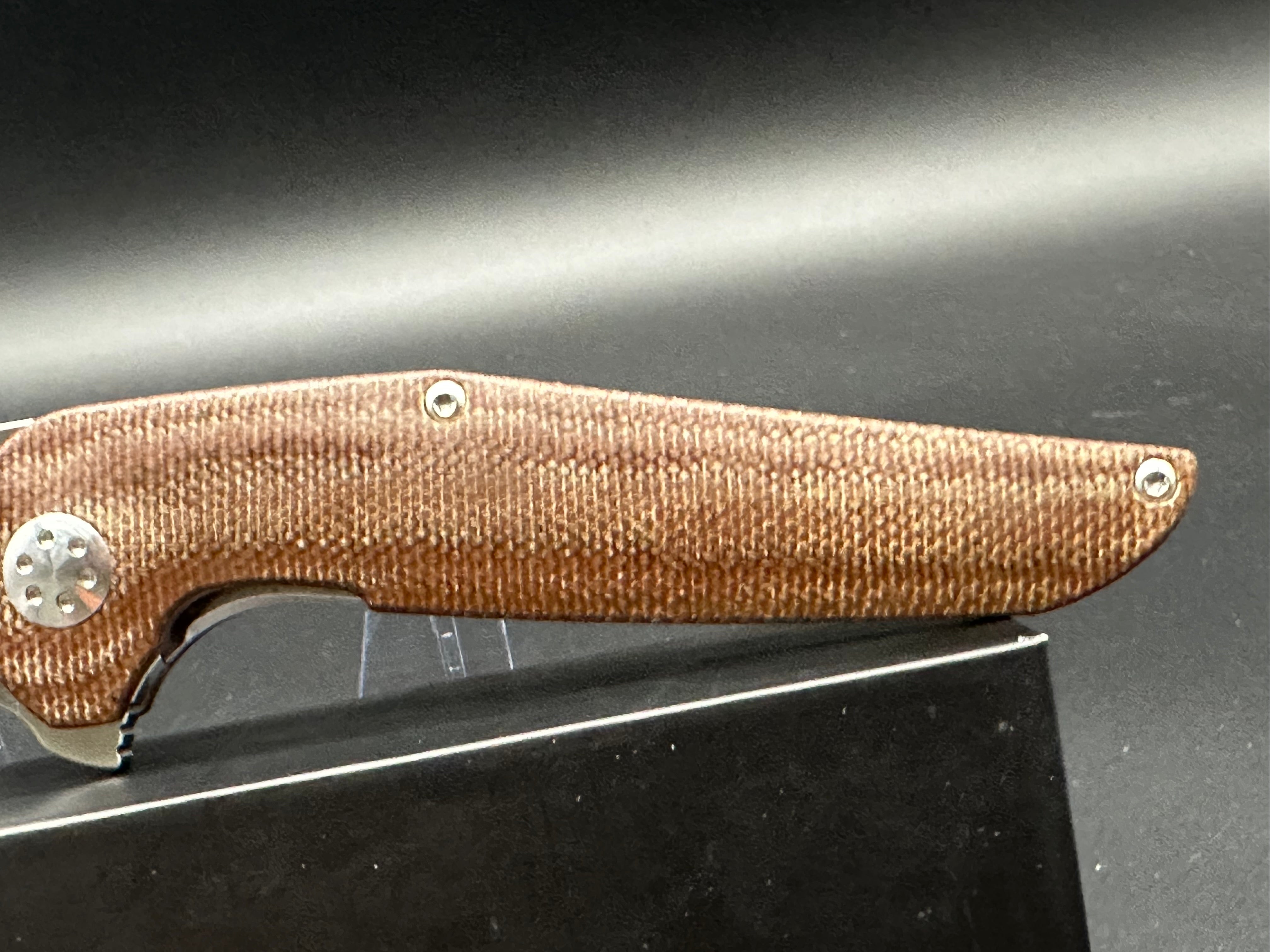 A Purvis Progeny MR micarta & 154CM blade