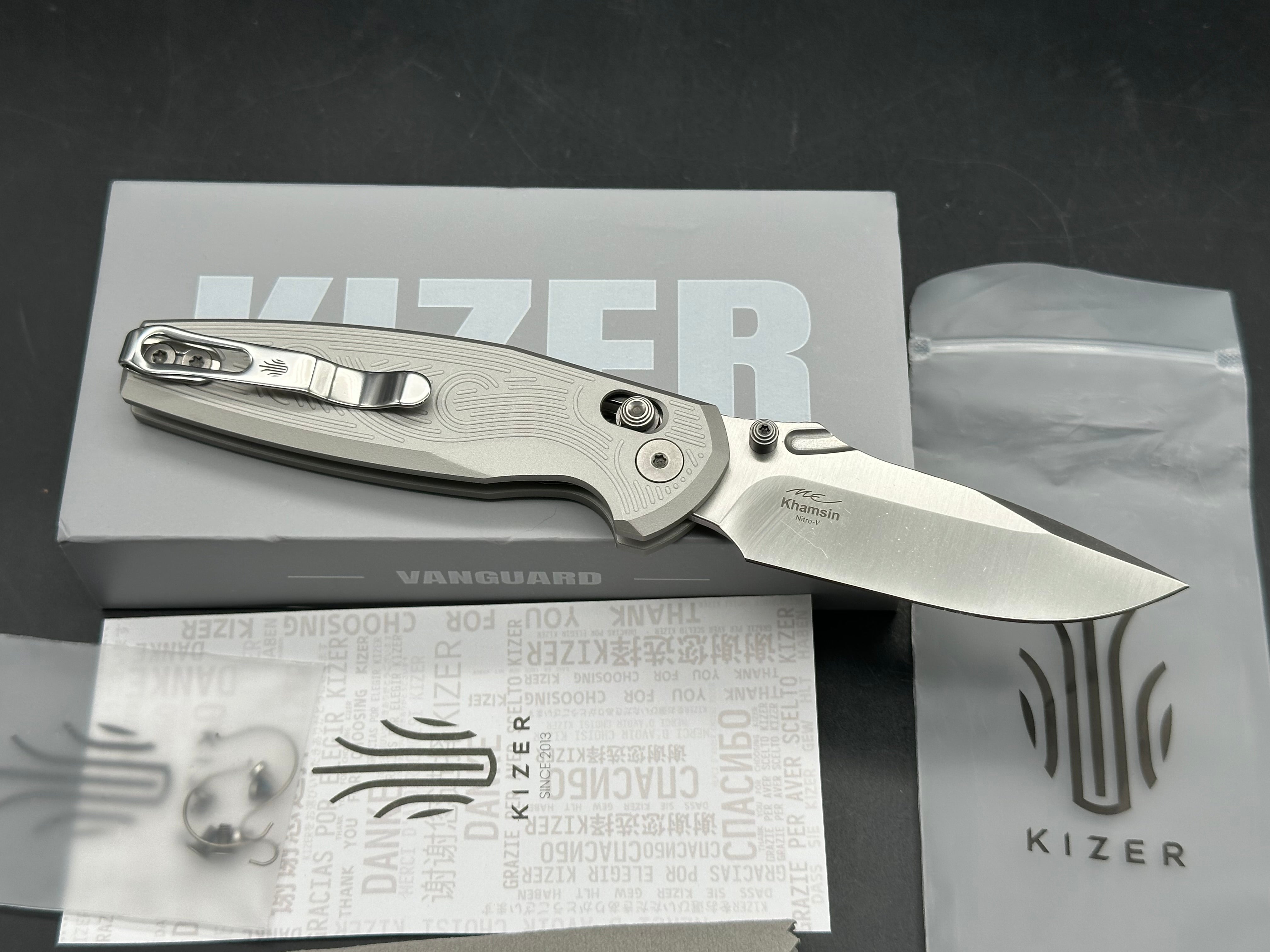 KIZER KHAMSIN FOLDING KNIFE SILVER ALUMINUM HANDLE NITRO-V DROP POINT PLAIN EDGE