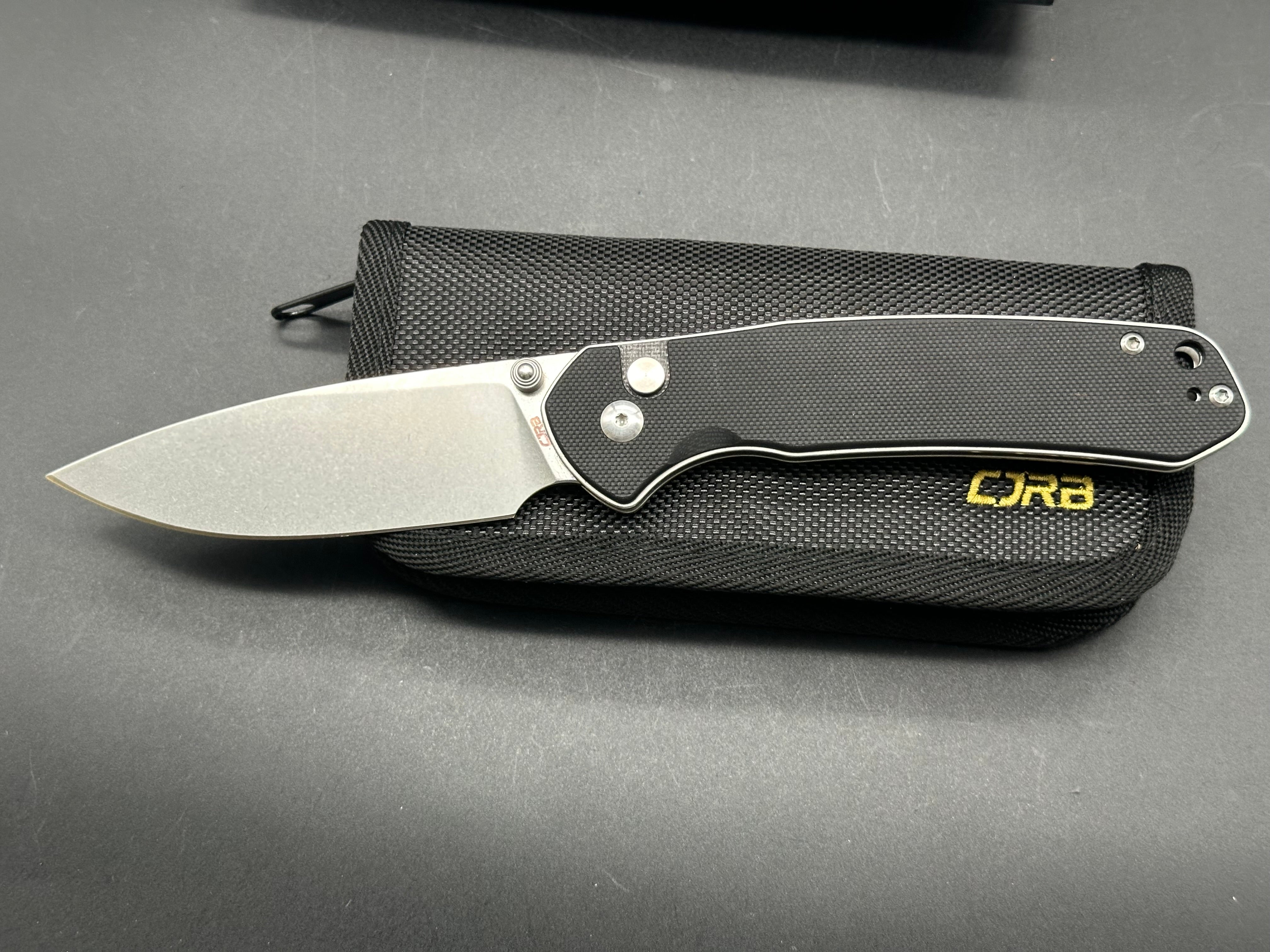 CJRB Cutlery Large Pyrite Button Lock Knife Black G-10