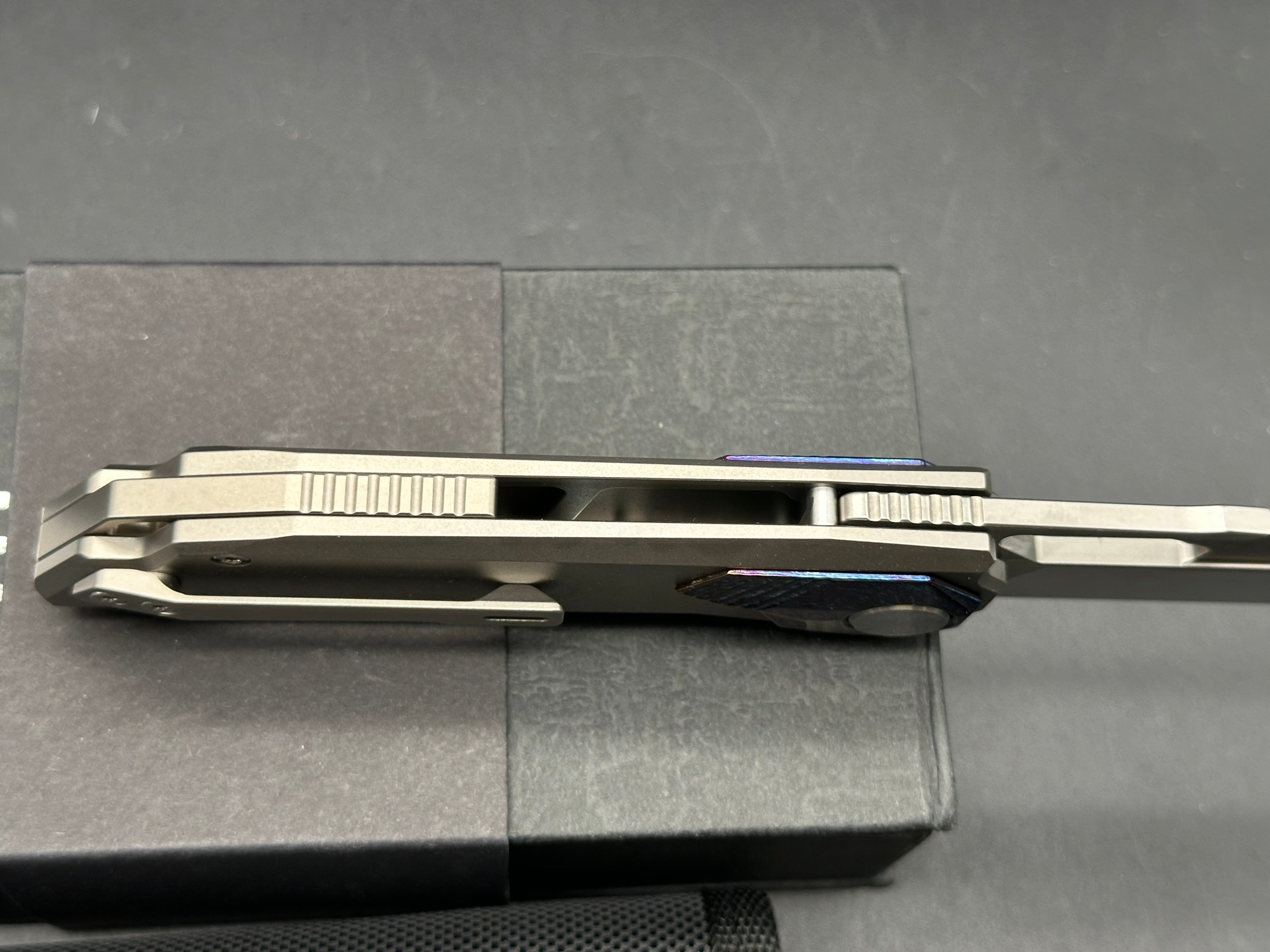 REMETTE RT-Peregrine Falcon Titanium M390 Knife Innovative Button Lock