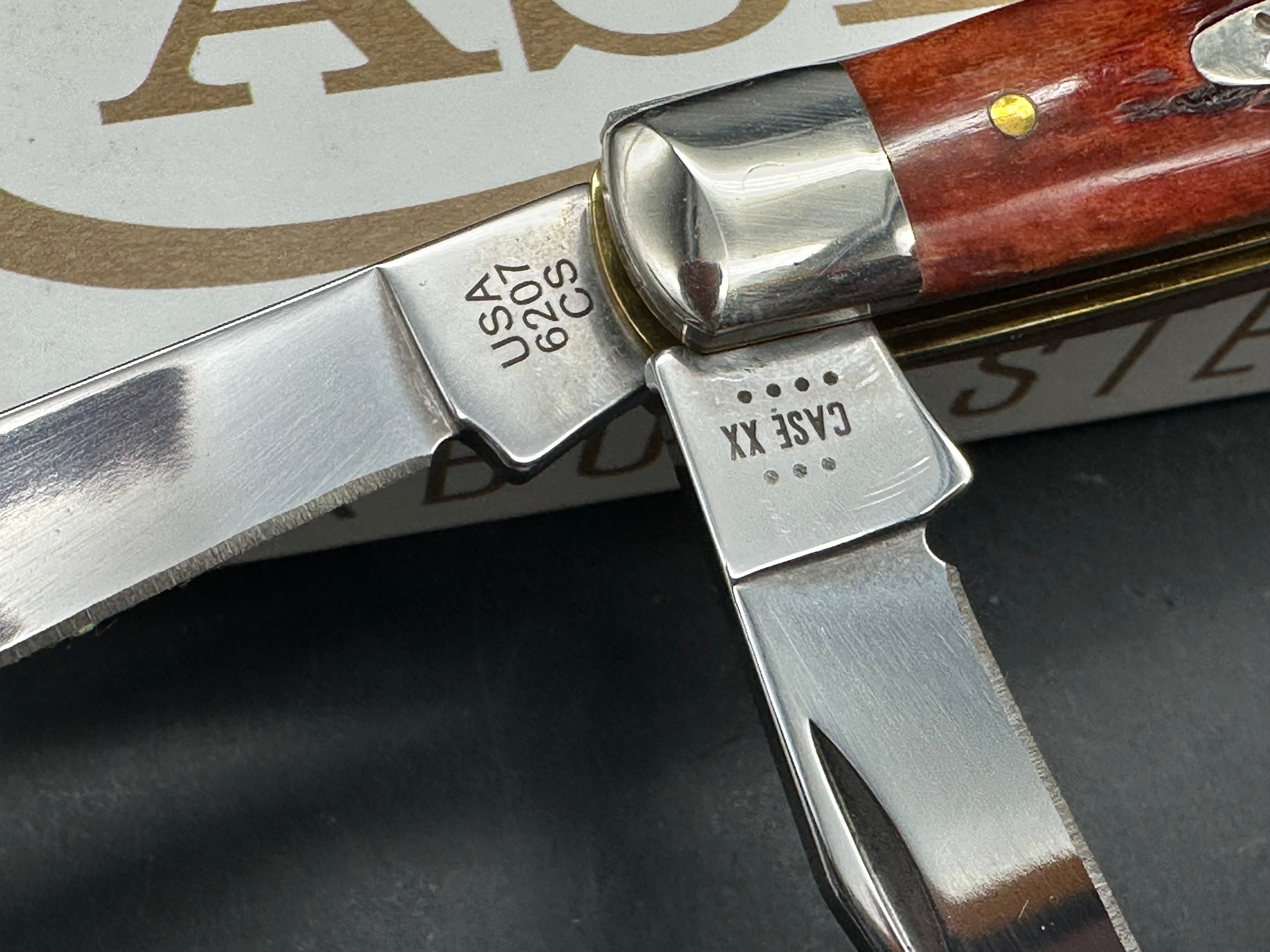 Case Mini Trapper mahogany bone peach seed milling on bone