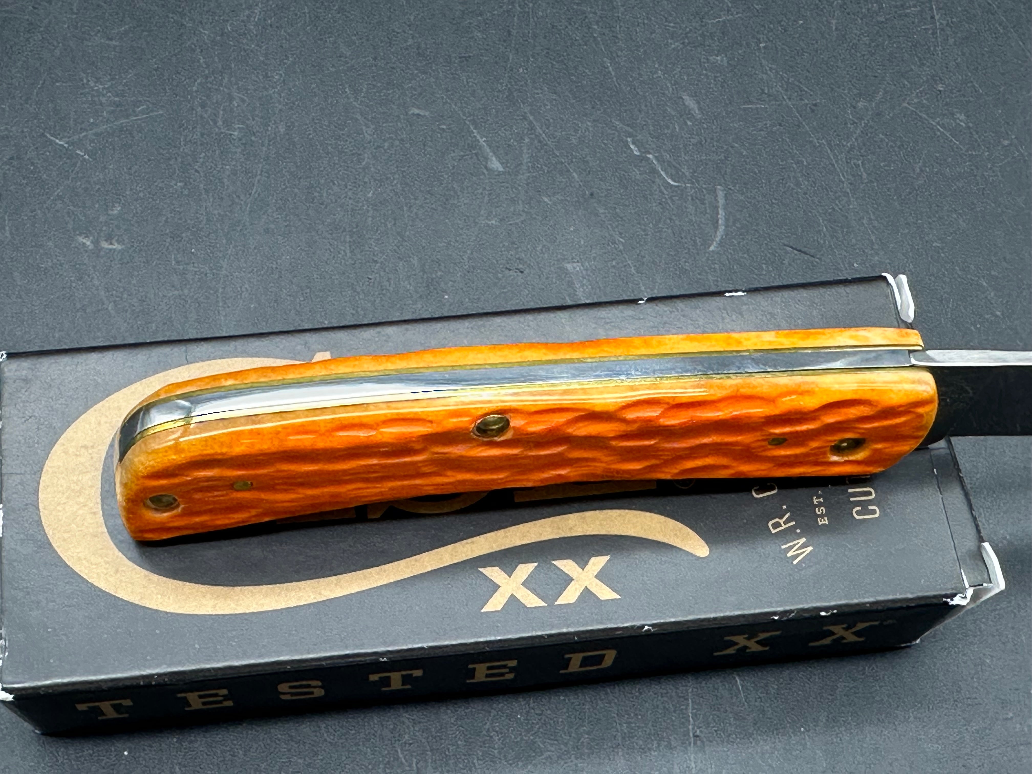 Case Sodbuster Jr persimmon orange bone stainless steel