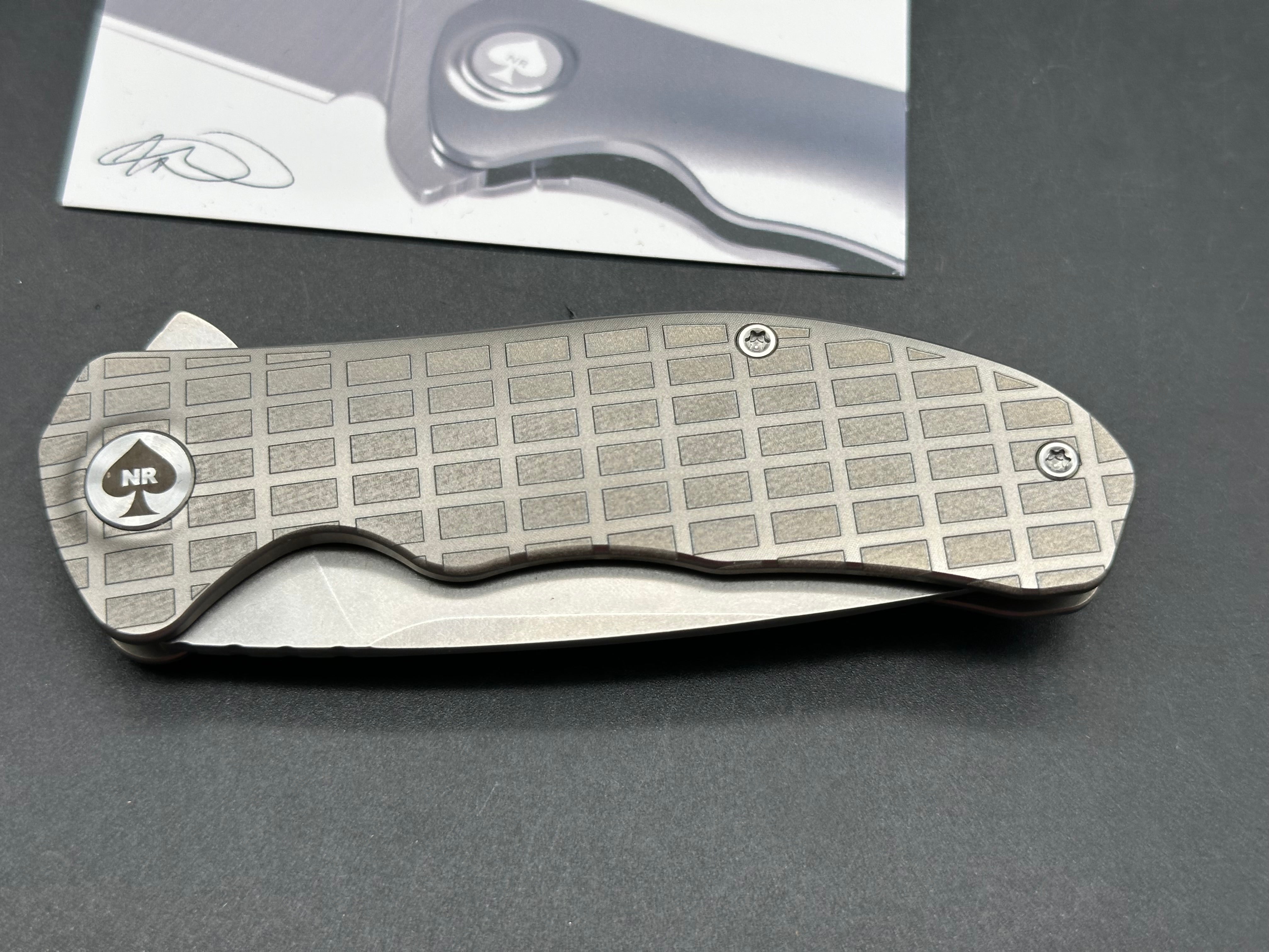 NRiggi Knives "JERSEY" Laser Engraved Titanium Scales w/CPM 20CV stonewash blade (brick pattern)