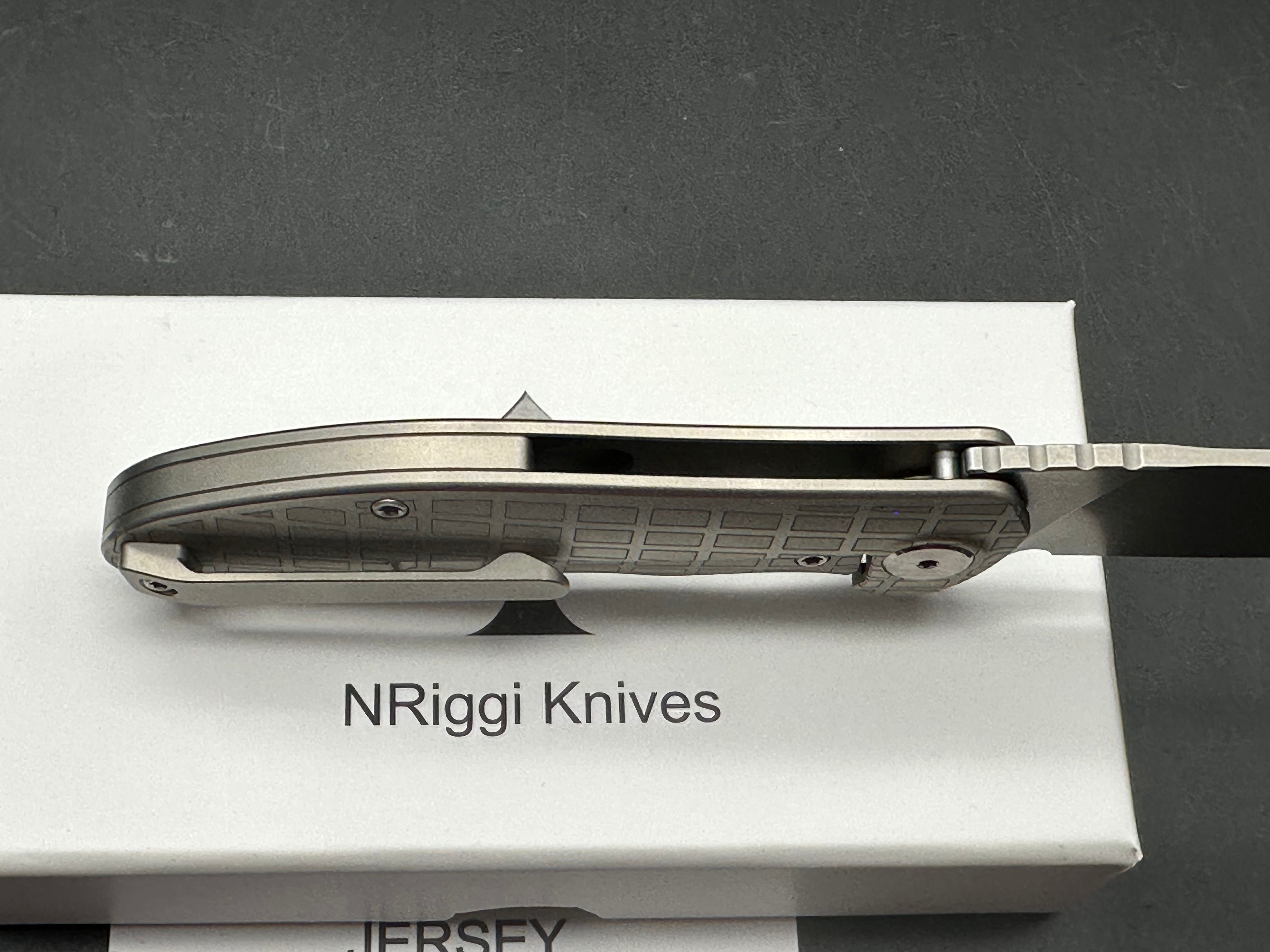 NRiggi Knives "JERSEY" Laser Engraved Titanium Scales w/CPM 20CV stonewash blade (brick pattern)