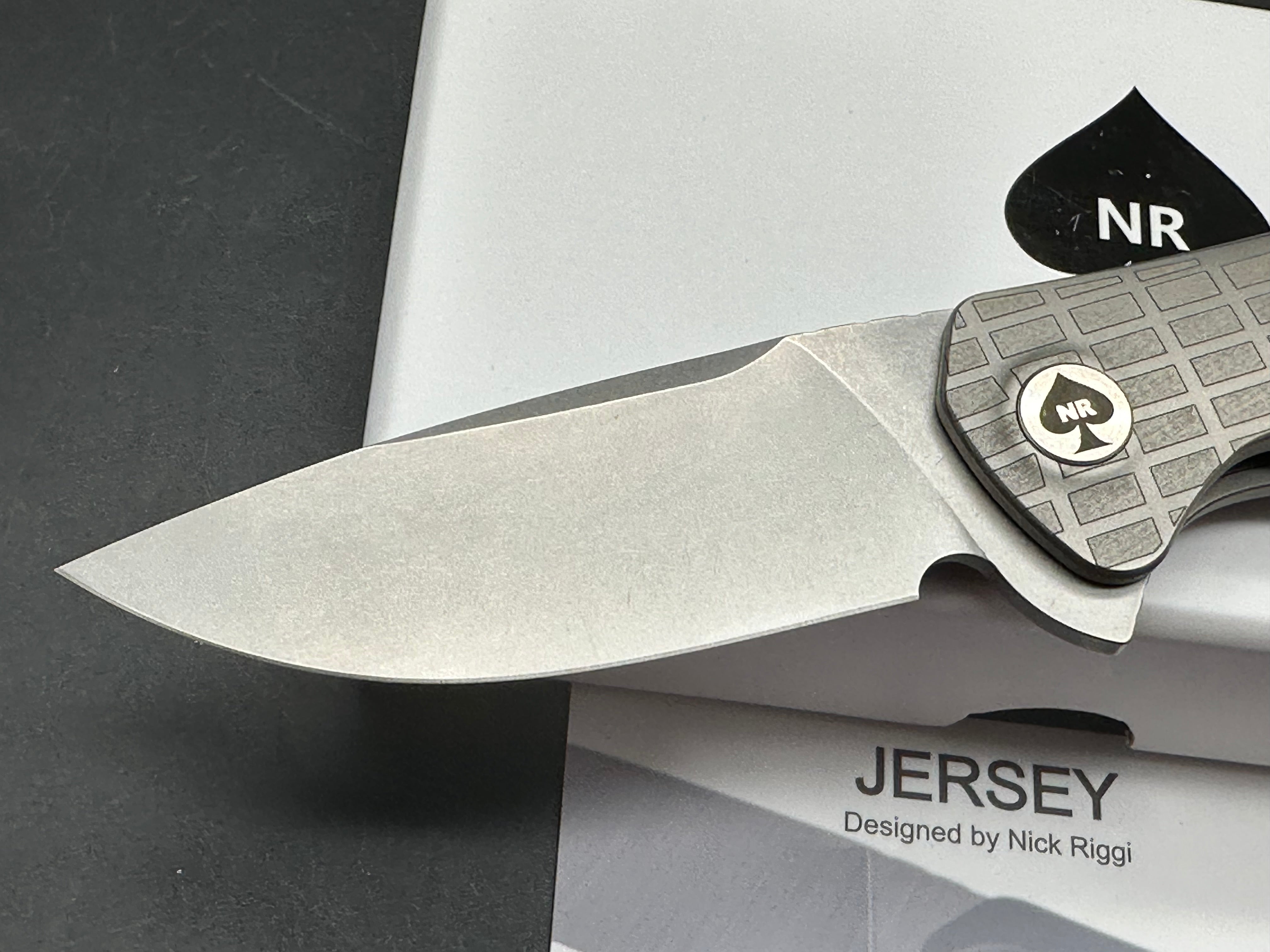 NRiggi Knives "JERSEY" Laser Engraved Titanium Scales w/CPM 20CV stonewash blade (brick pattern)