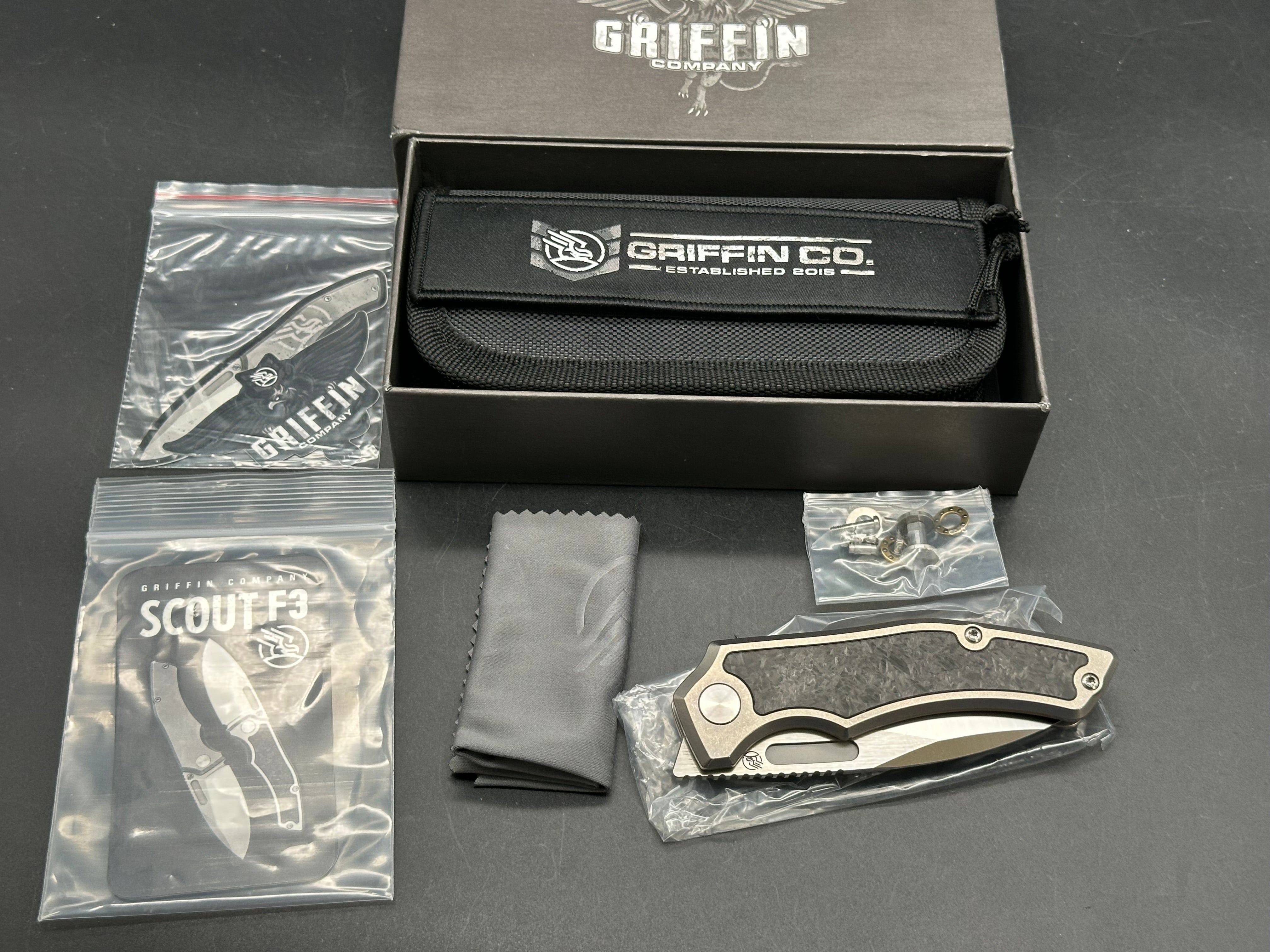 Griffin Company Scout F3 (First Run), Belt Satin M390 Blade, Tumbled Titanium Handles w/Marbled Carbon Fiber Inlays