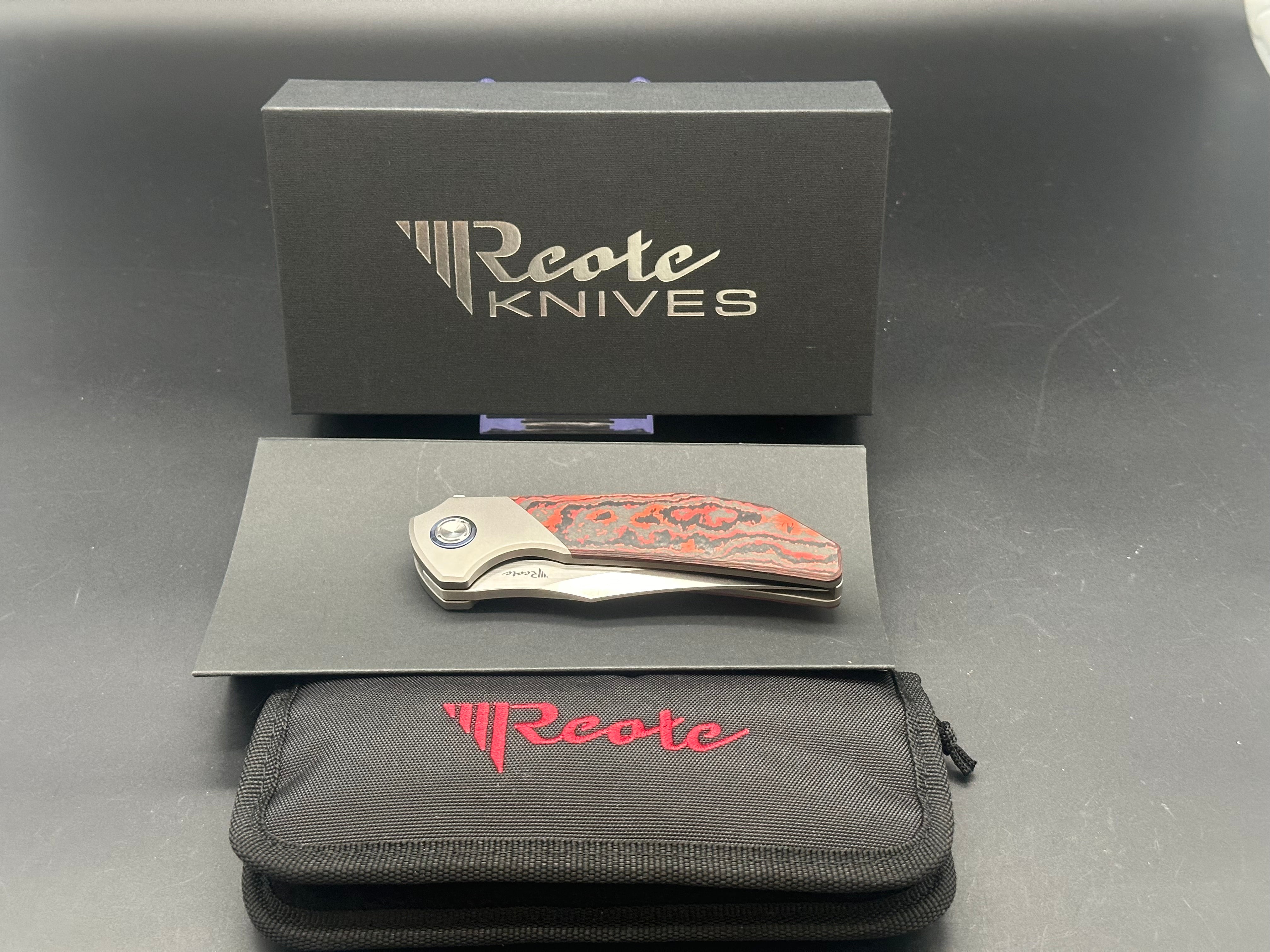 REATE KNIVES TIGER LAVA FLOW FAT CARBON FIBER HANDLE M390 PLAIN EDGE BELT SATIN