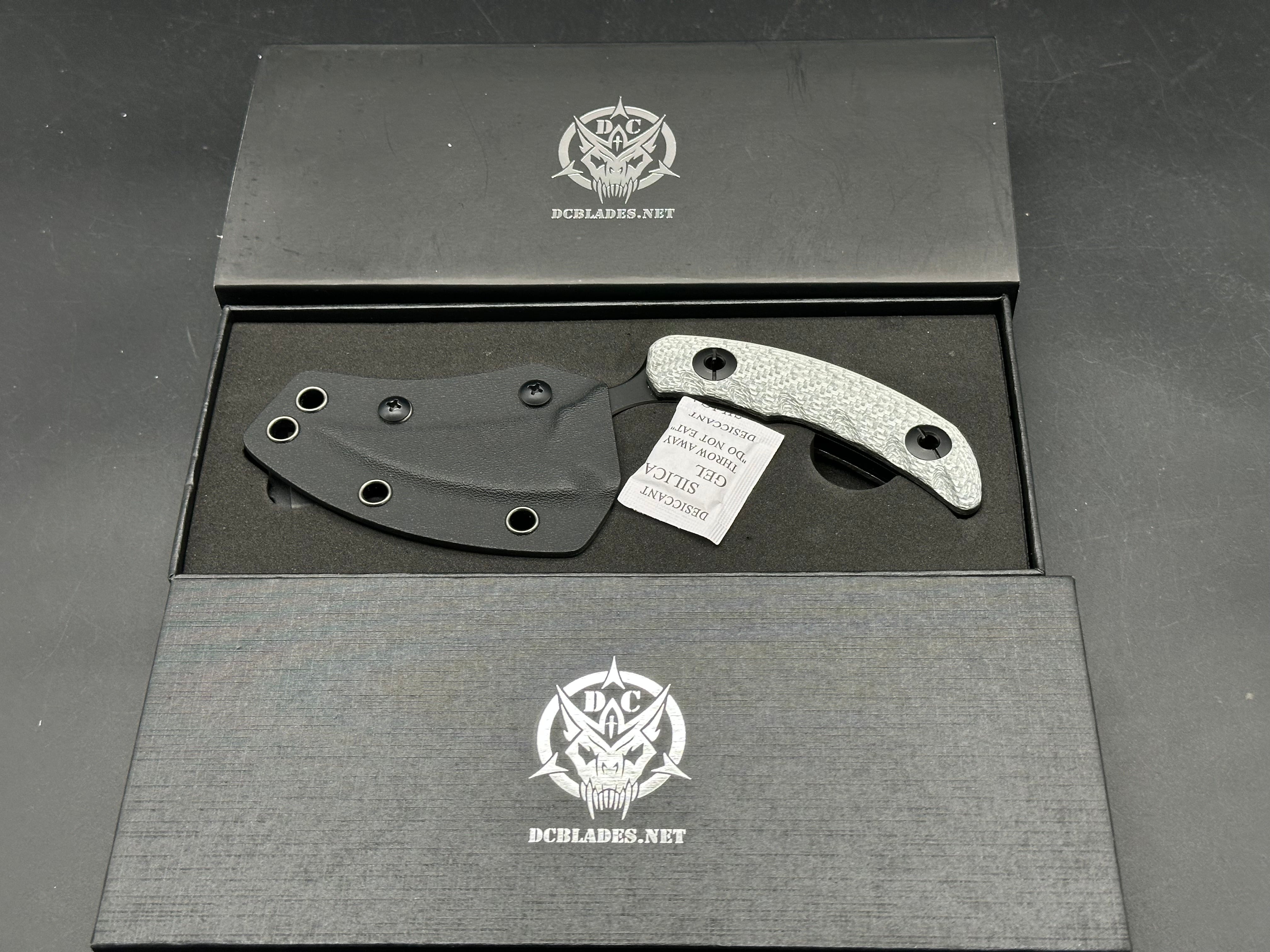 DC Blades Mantis Fixed blade 3.25" Black PVD Blade with Serrations 14C28N Silver Twill Carbon Fiber Handle
