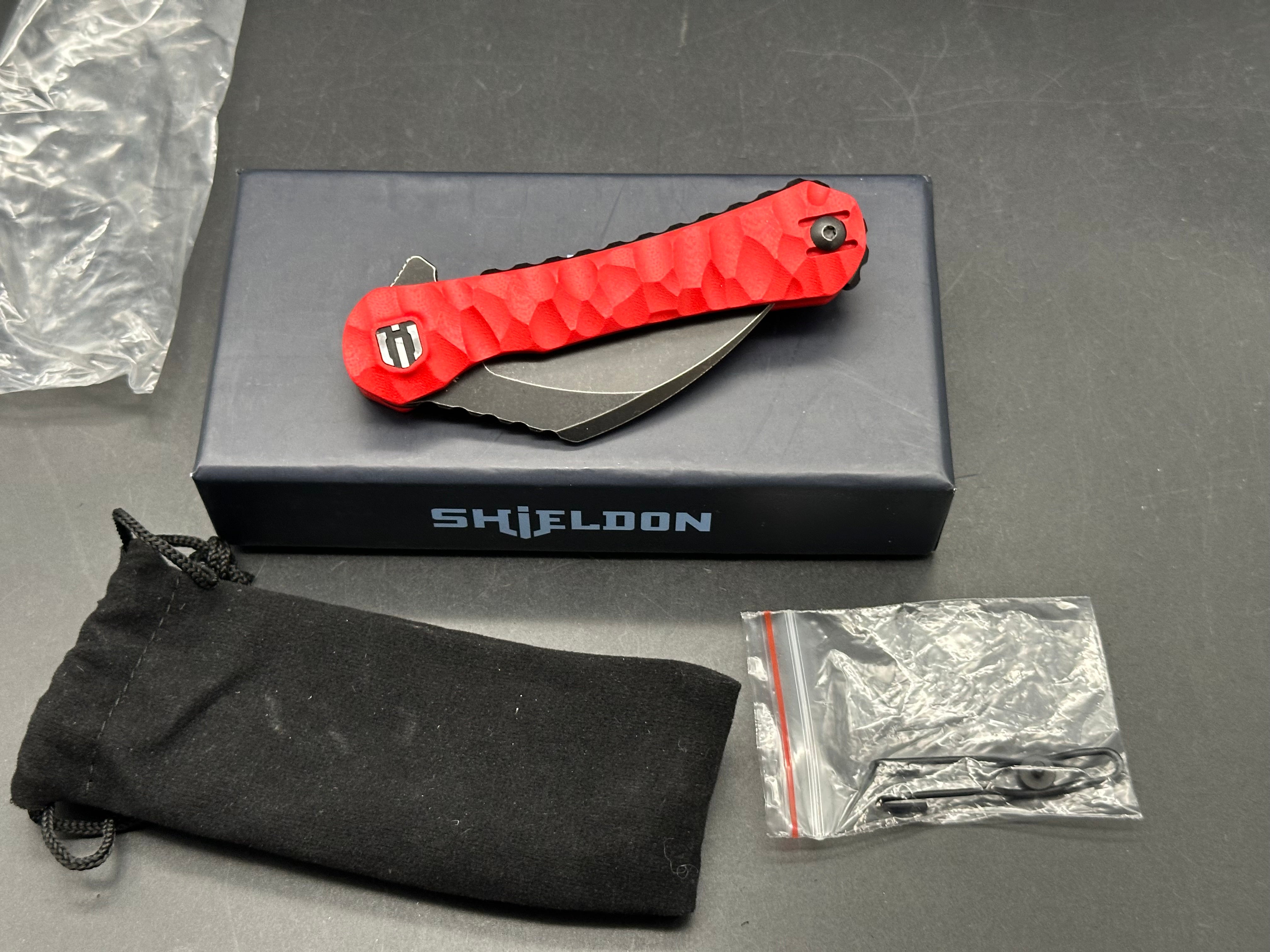 Shieldon Blades Scythe XL folder Blackwash Titanium coated blade of 154CM Red G10 Handle