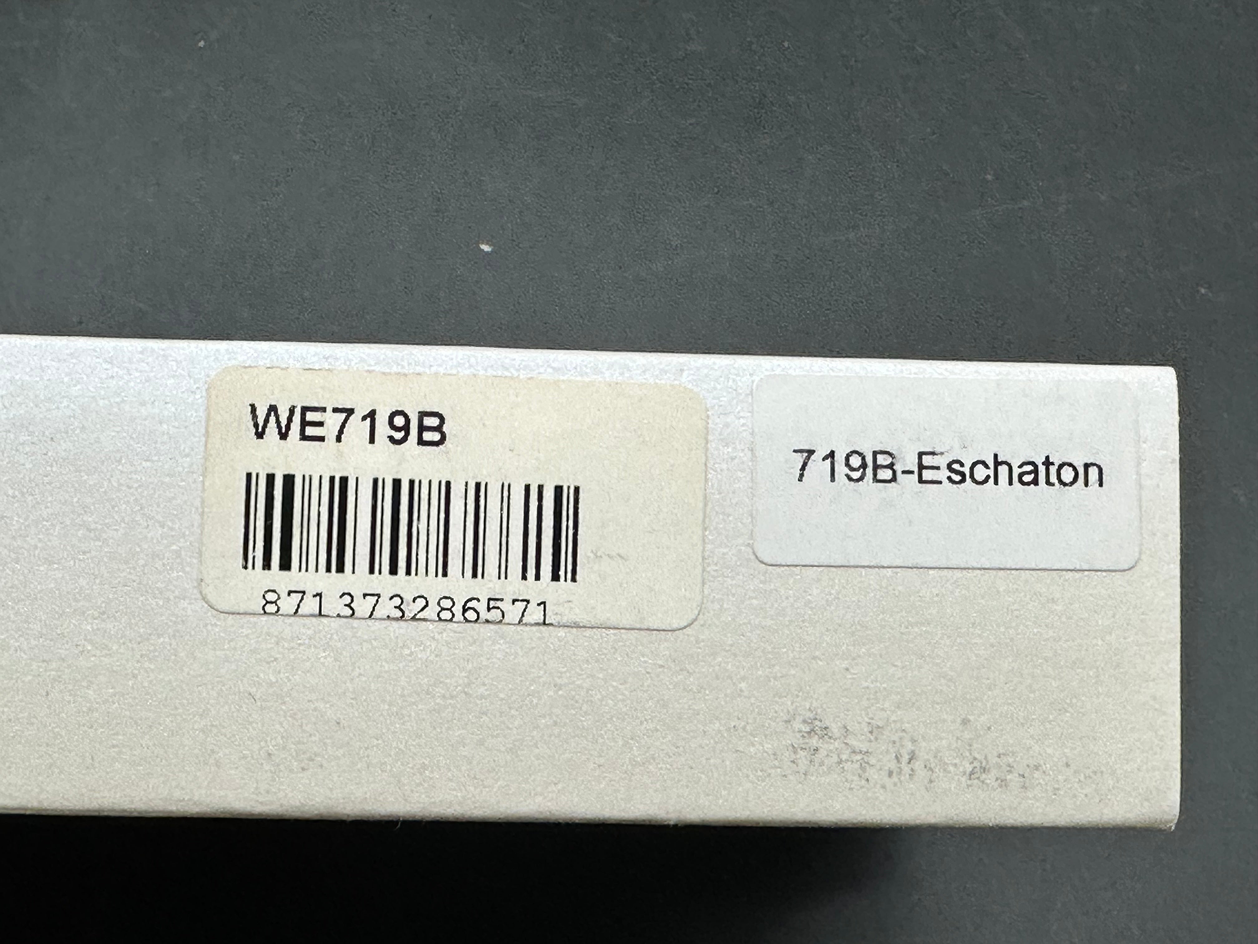We Eschaton: Elijah Isham design. 3.83 inch, M390, flat grind wharncliffe blade Carbon fiber and titanium handle