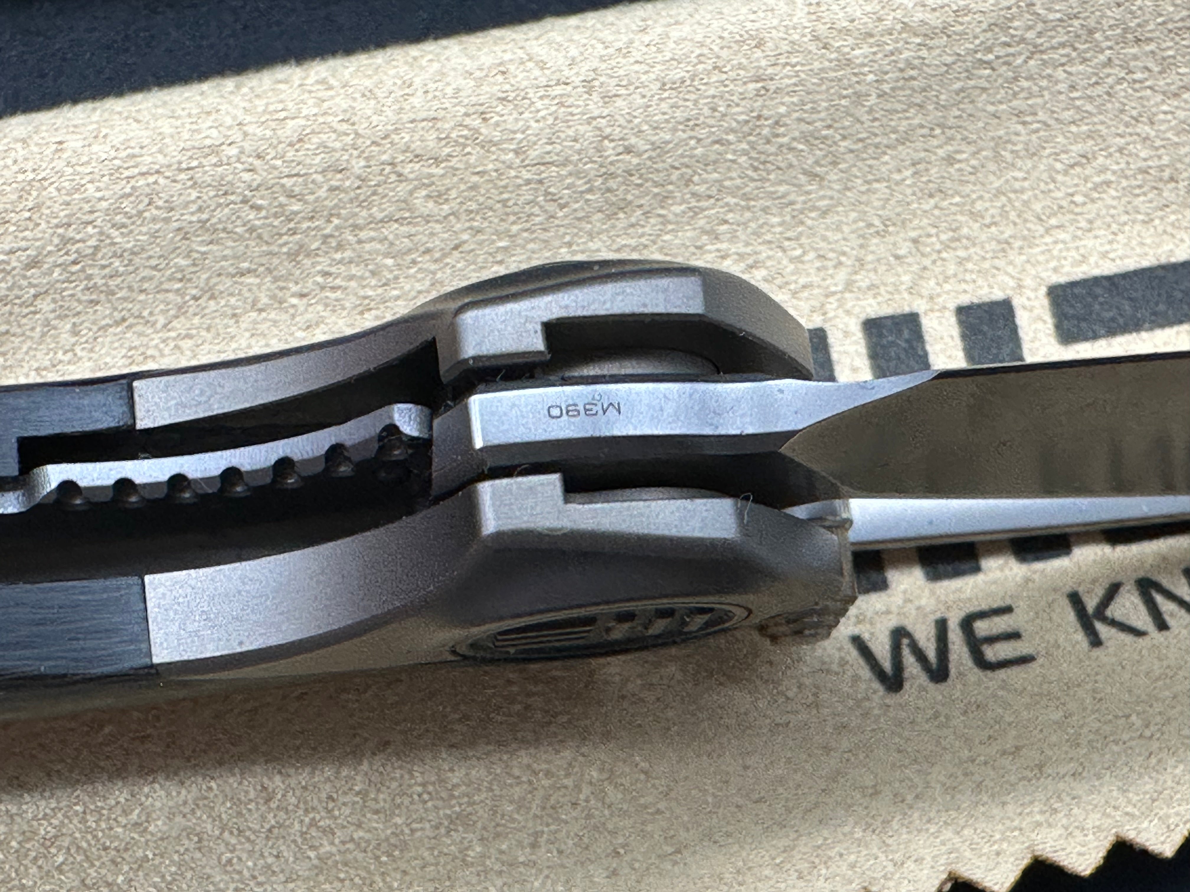 We Pleroma: Elijah Isham design. 2.95 inch M390 Carbon fiber and integral champagne titanium handle