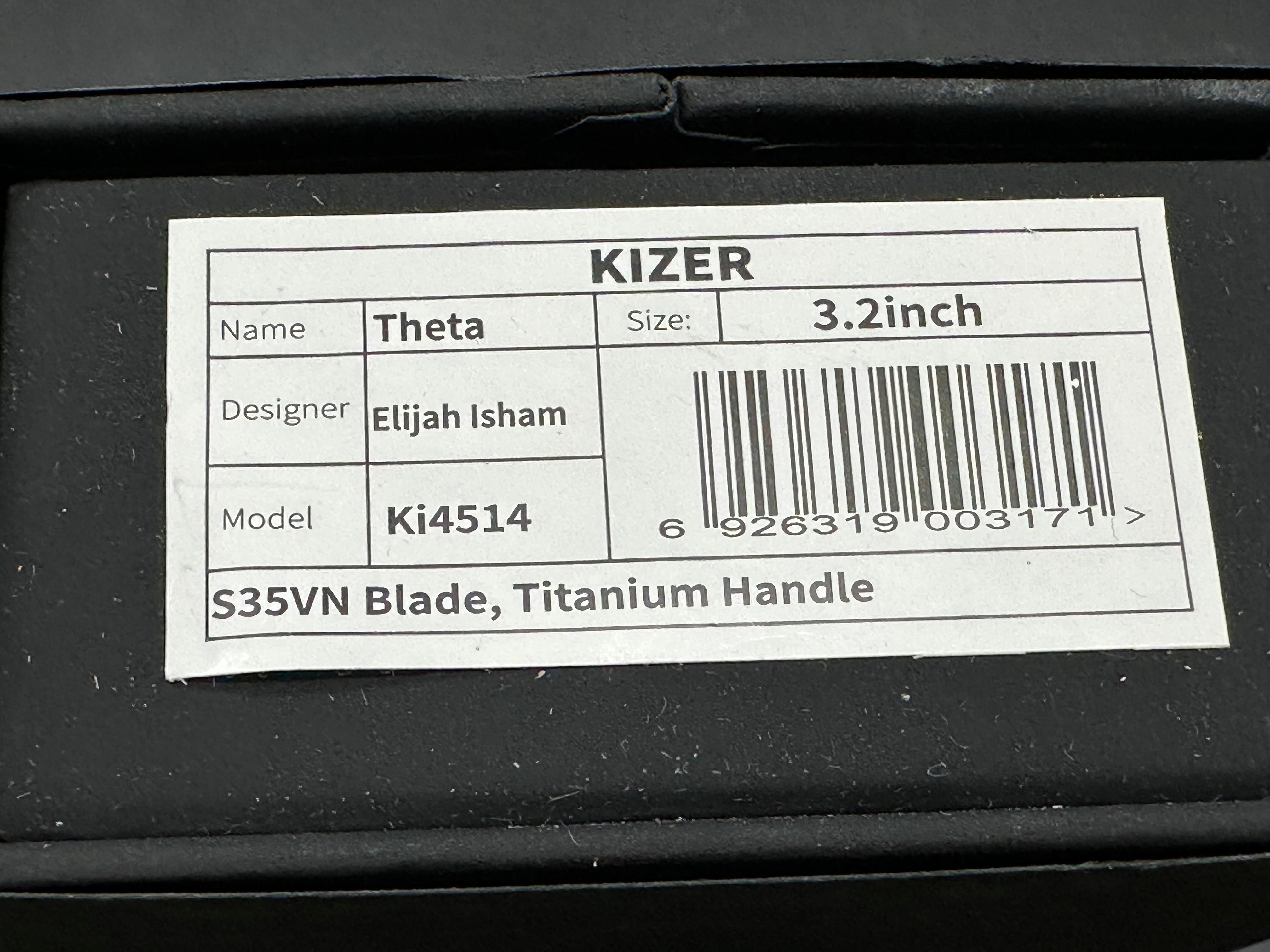 Kizer Theta: Elijah Isham design. 3.125 inch, stonewashed, flat grind, Wharncliffe CMP-S35V blade. Titanium handle