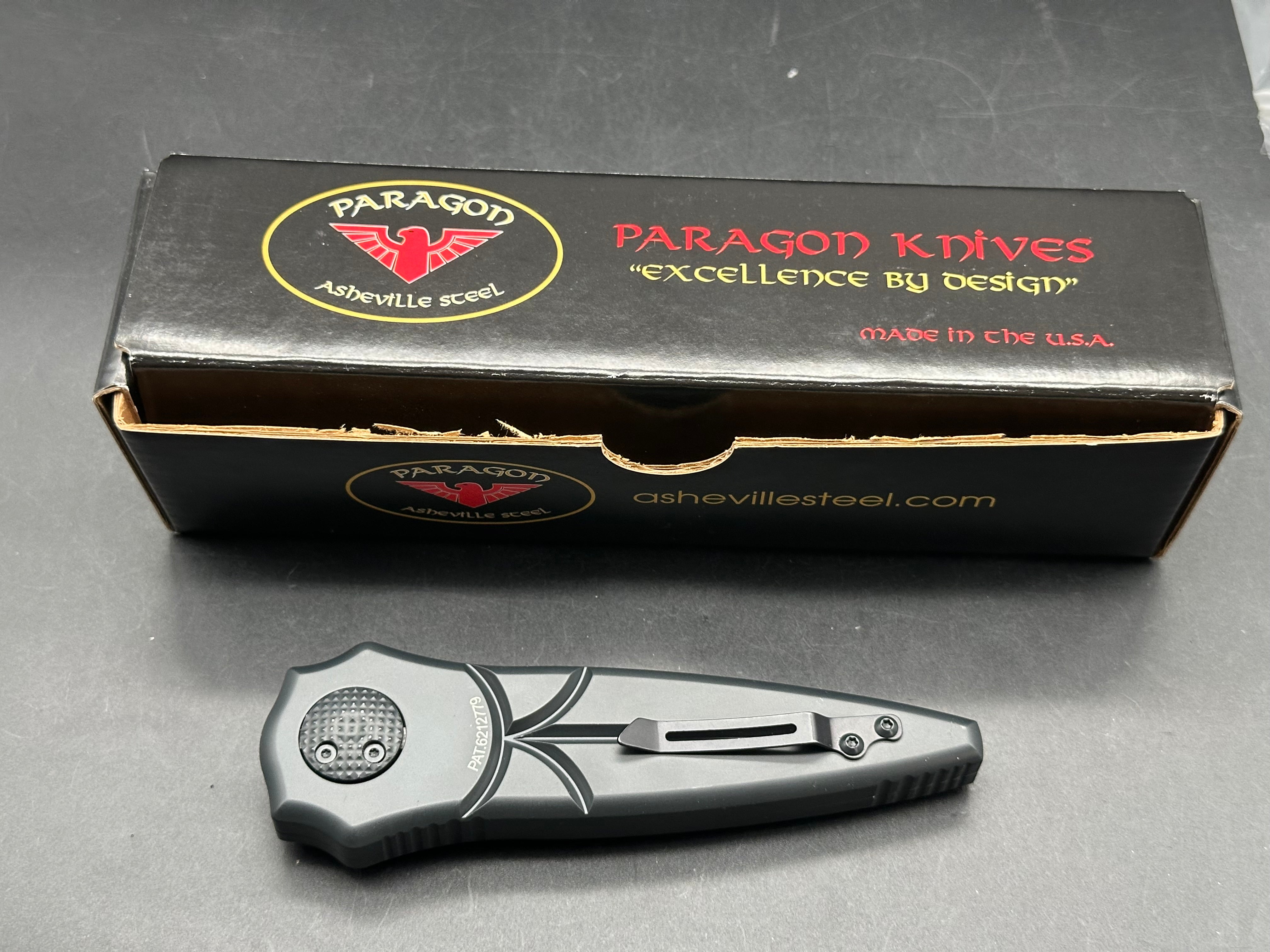 Paragon Warlock: 3.875 inch CPM-S30V blade with double edge. Double pus button split handle opener