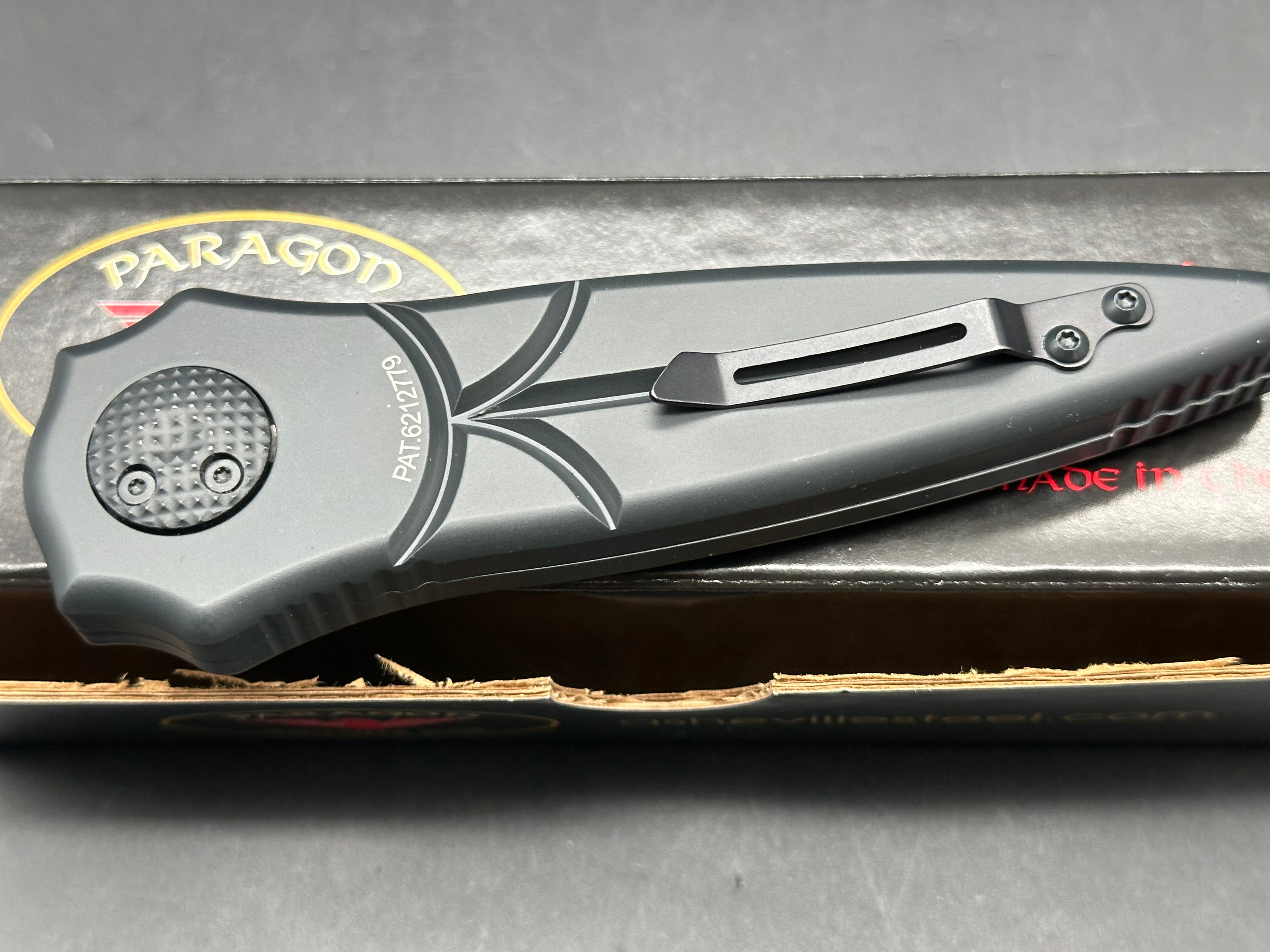 Paragon Warlock: 3.875 inch CPM-S30V blade with double edge. Double pus button split handle opener