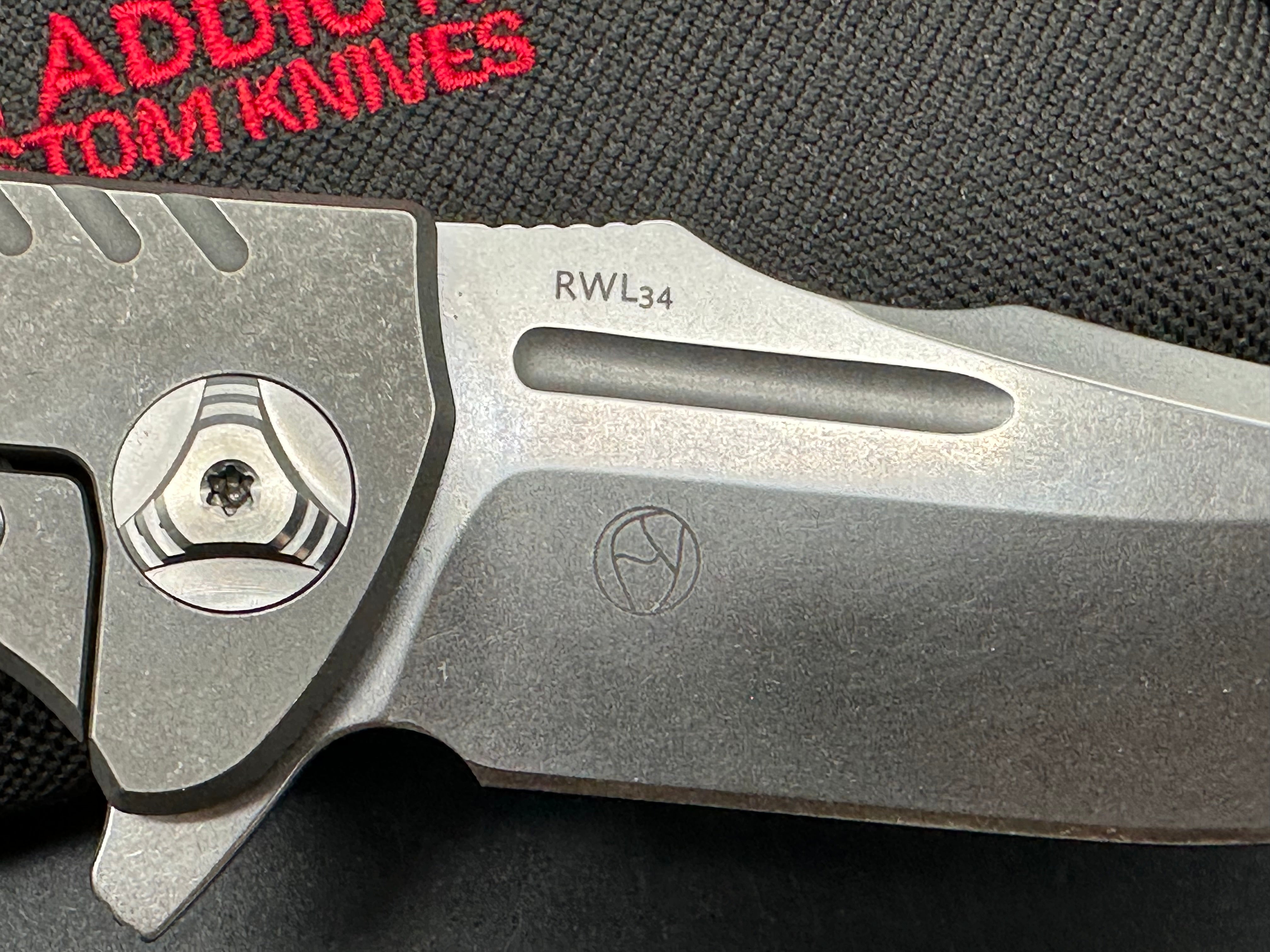 Reate Valhalla: Faisal Yamin design. 3.875 inch, clip point, stonewashed, flat grind freeze edged RWL-34 blade