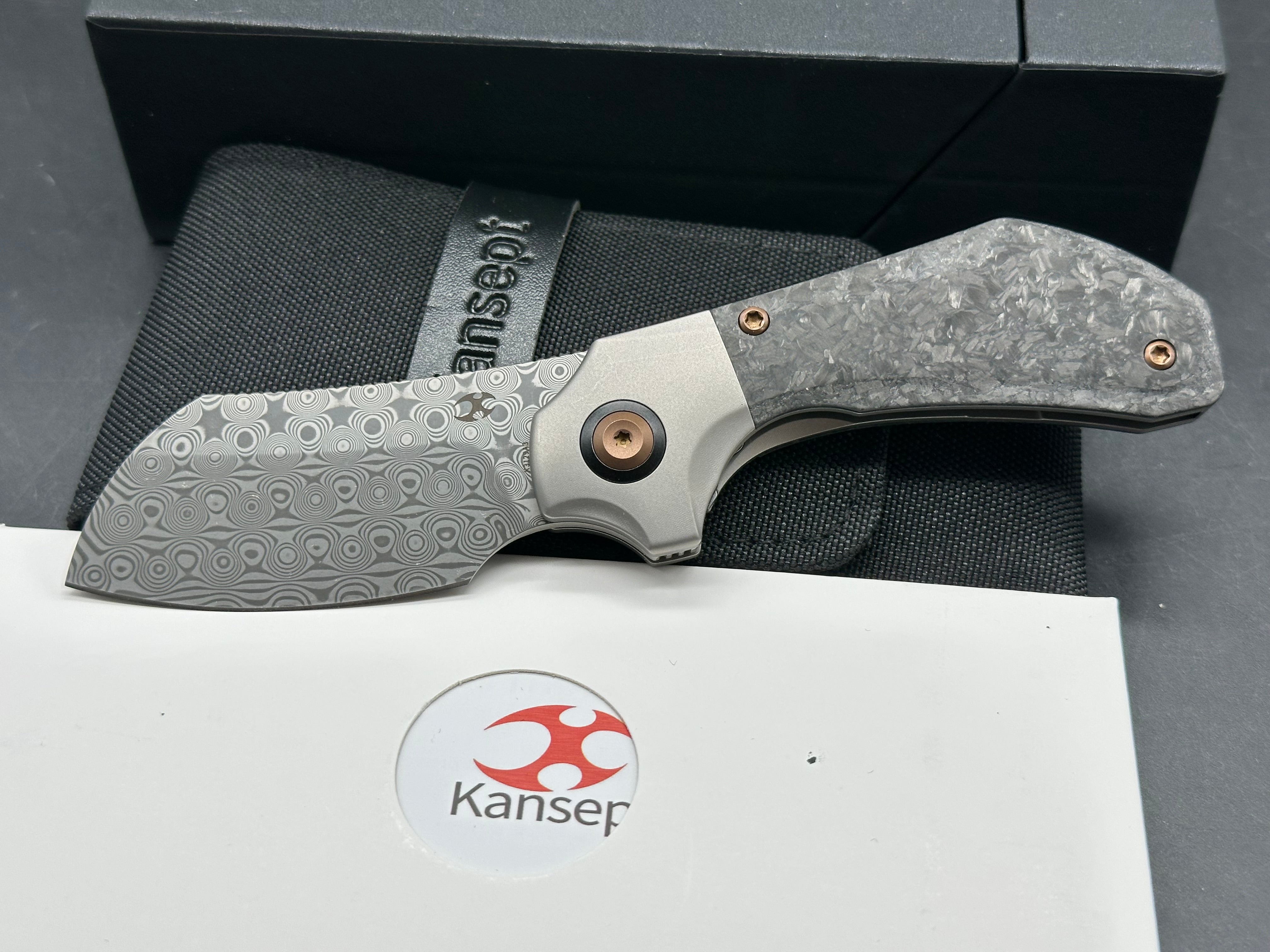 KANSEPT PLUTO FOLDING KNIFE STONEWASH TITANIUM/SHRED CARBON FIBER HANDLE DAMASCUS DROP POINT PLAIN EDGE