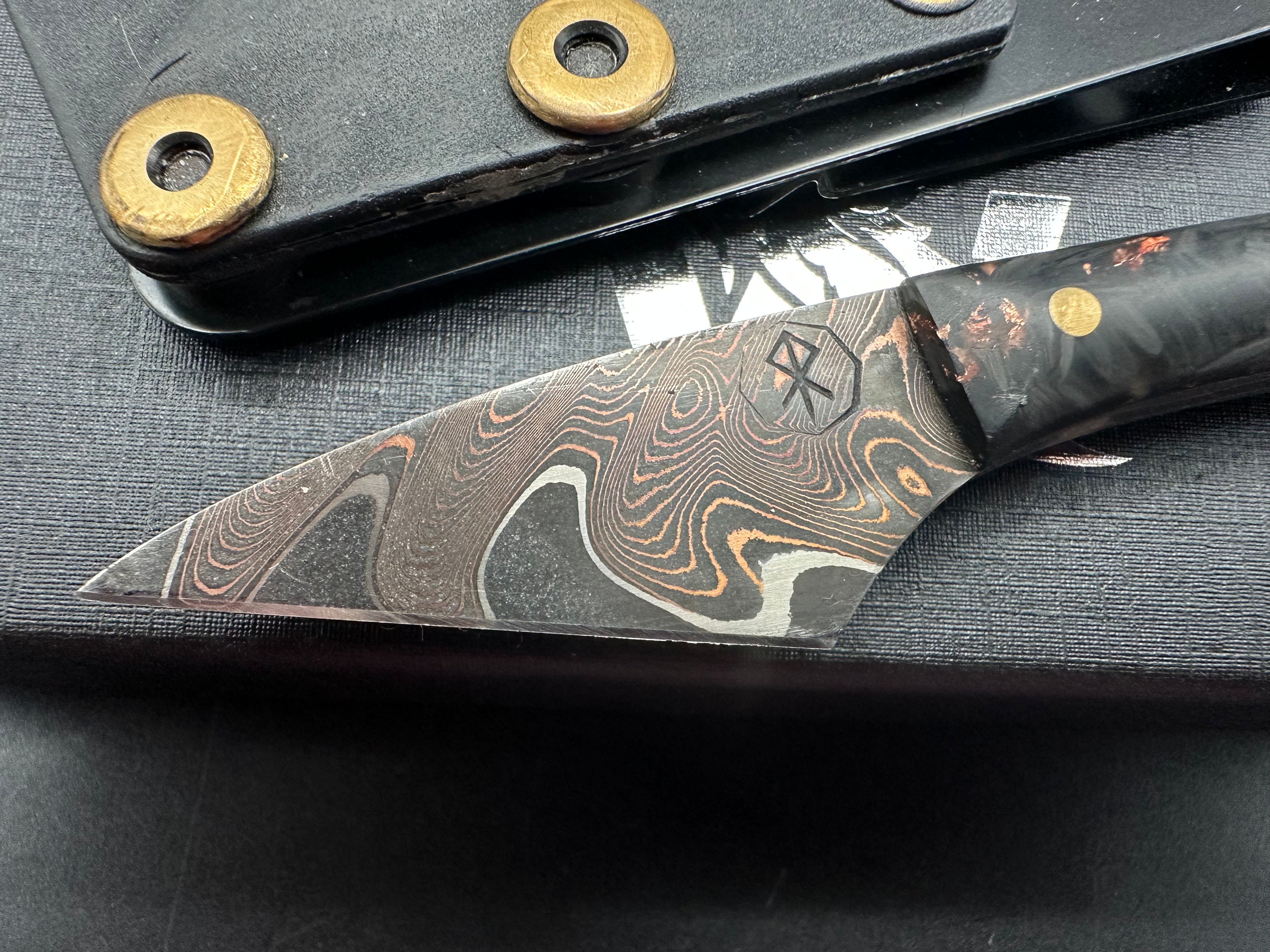 Raymond Roberts of Royalty Rings Co. Kiradashi Bakers Forge Damascus steel with copper and 80CRV2 core