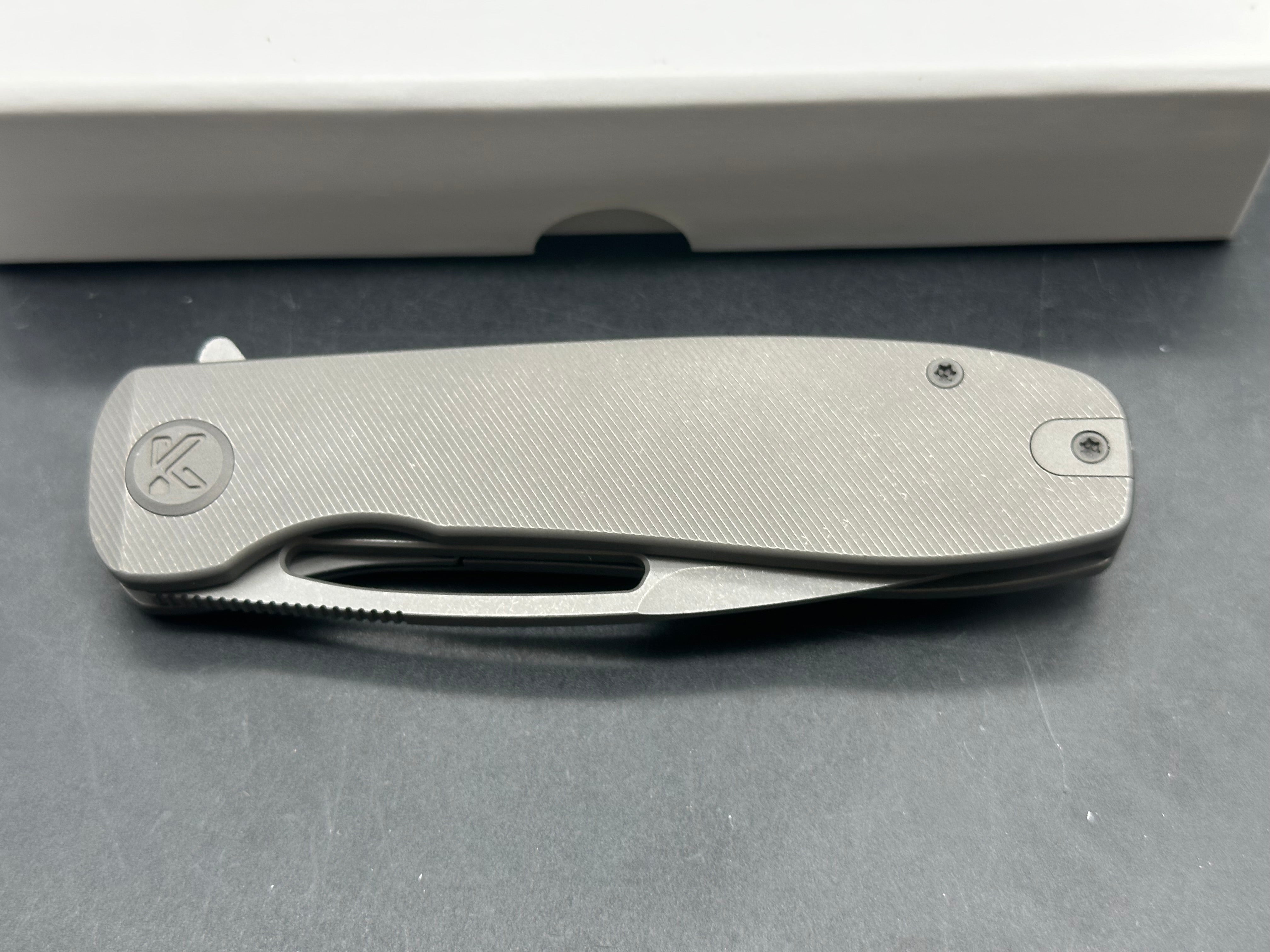 Kubey Supercell Folding Knife Darkblast Titanium Handle 14C28N Plain Edge Darkblast 7.99 inches overall