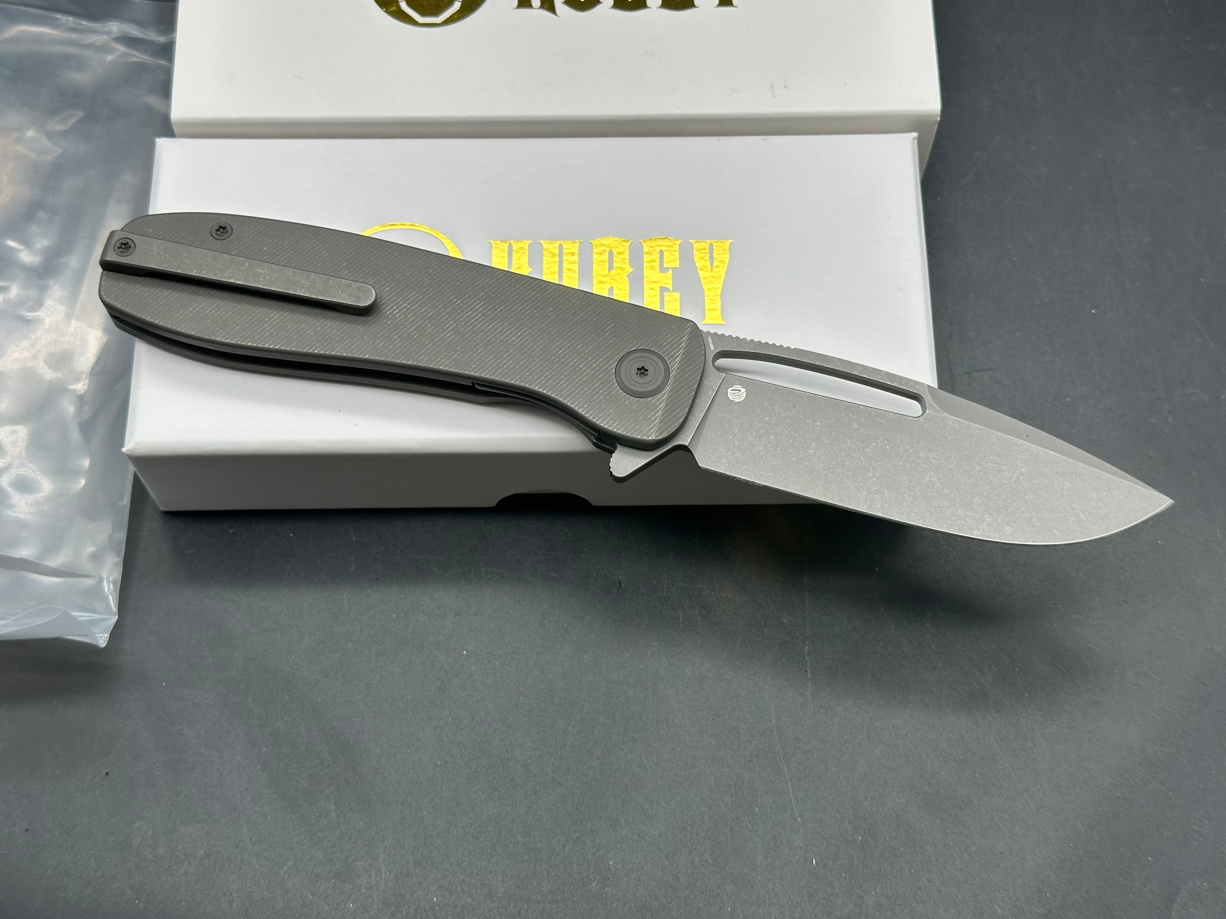 Kubey Supercell Folding Knife Darkblast Titanium Handle 14C28N Plain Edge Darkblast 7.99 inches overall