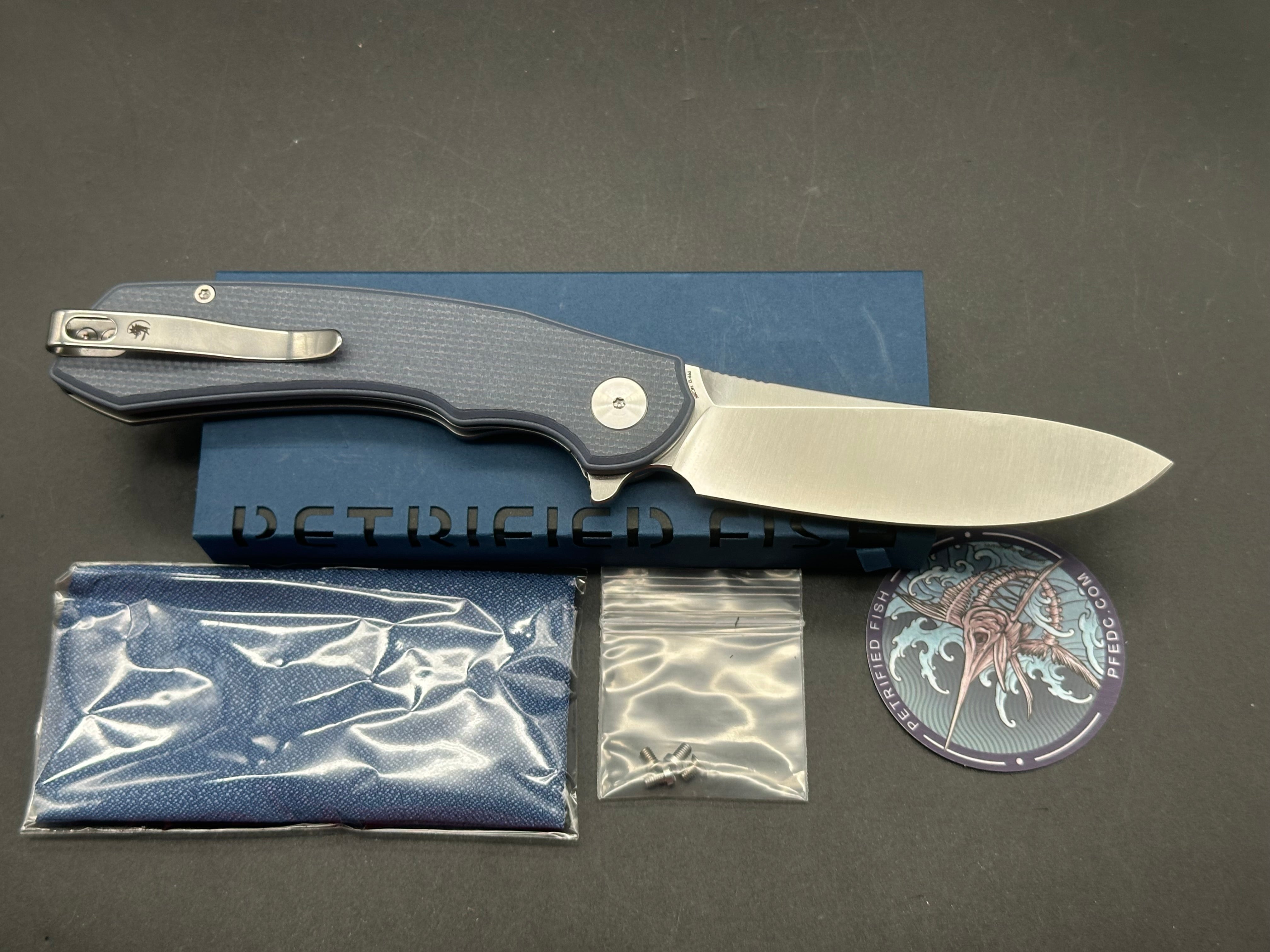 Petrified Fish PFP12- WaterSpout , 3.54" 14C28N Steel Blade, G10 Handle, Flipper Liner lock