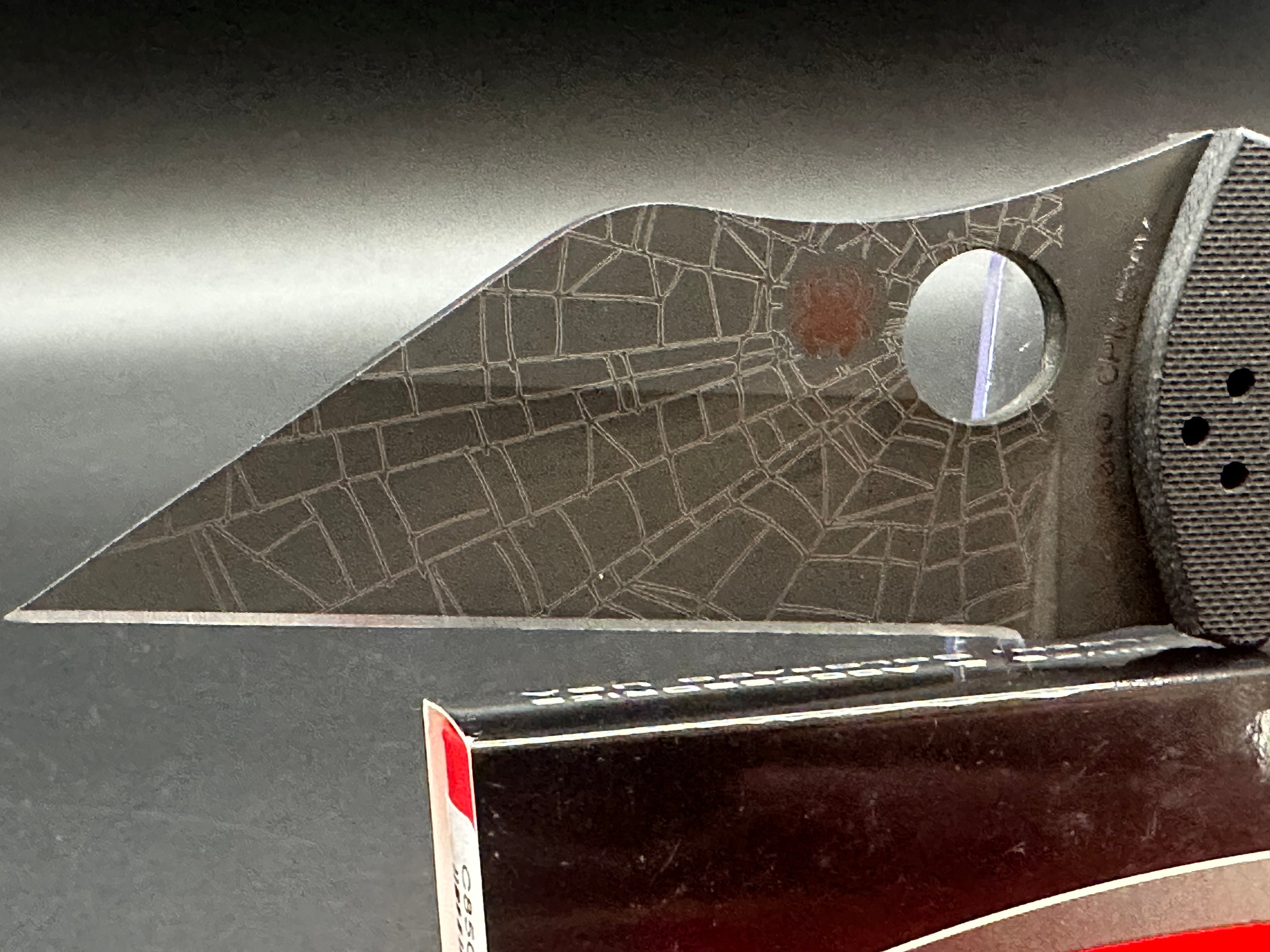 Spyderco Yojimbo 2 Black customized by Lynch NW with laser engraved spider web on blade
