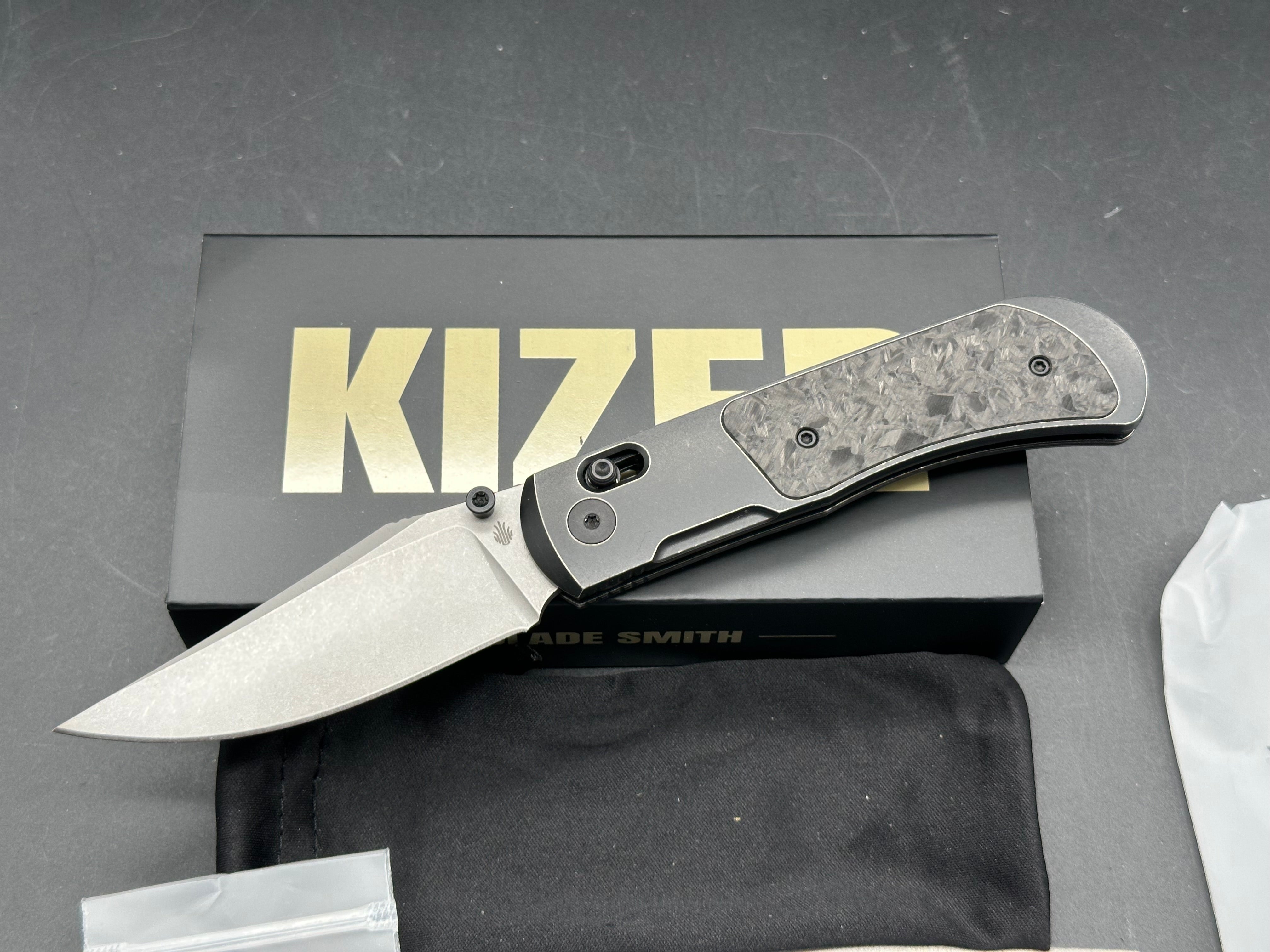 KIZER TYCHO FOLDING KNIFE TITANIUM/CARBON FIBER HANDLE M390 CLIP POINT PLAIN EDGE STONEWASH FINISH