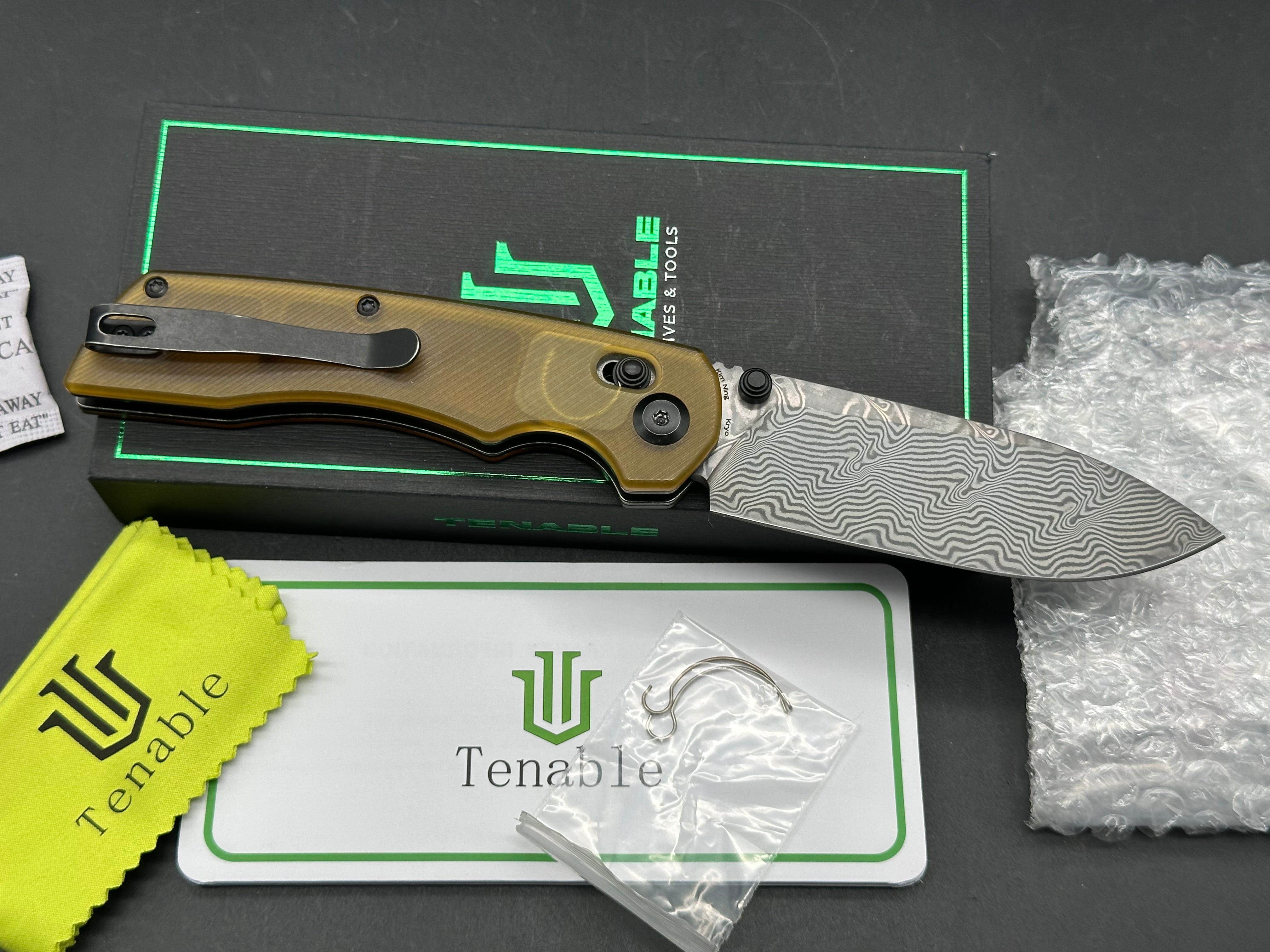 TENABLE KRYO FOLDING KNIFE AMBER PEI/ULTEM HANDLE DAMASCUS DROP POINT PLAIN EDGE