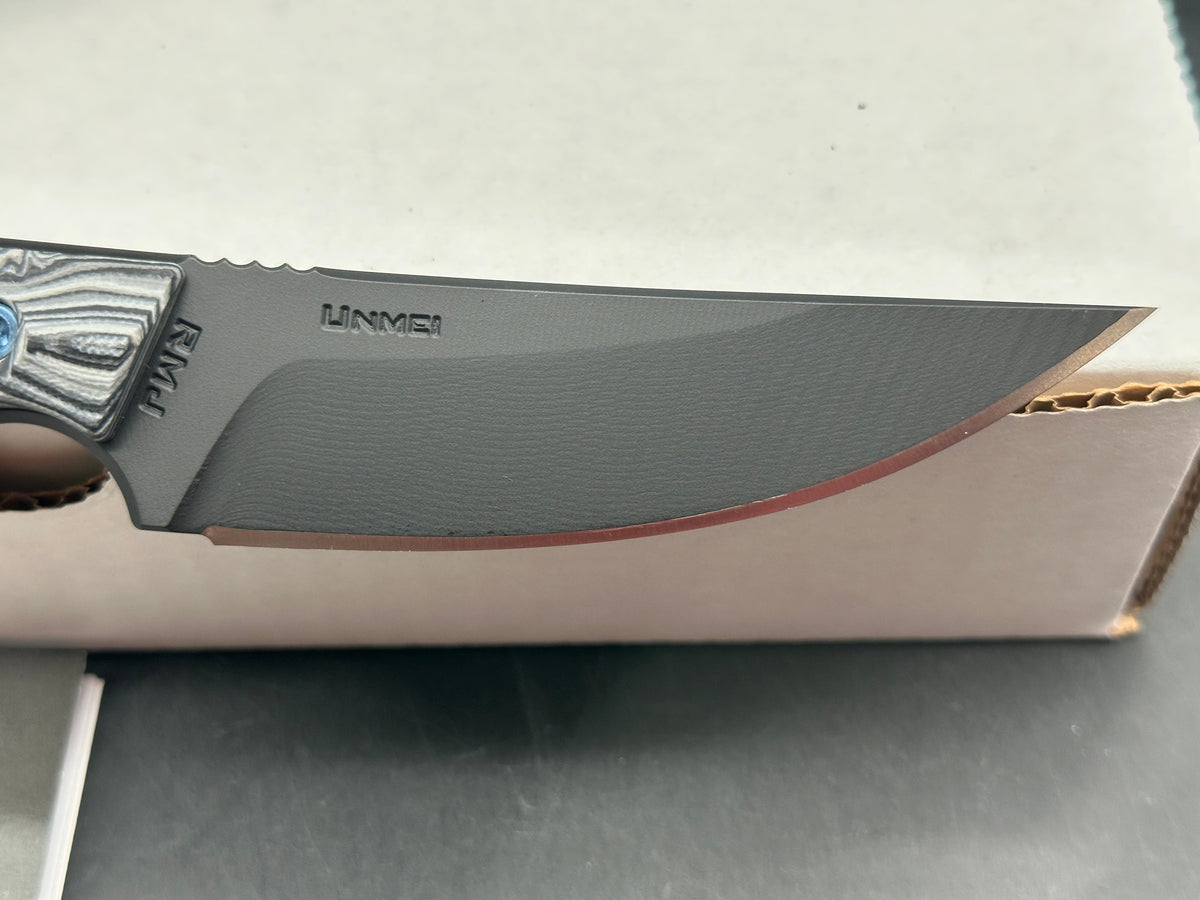 RMS Tactical Unmei DLT Exclusive with Urban Camo handles. Black Magnacut blade