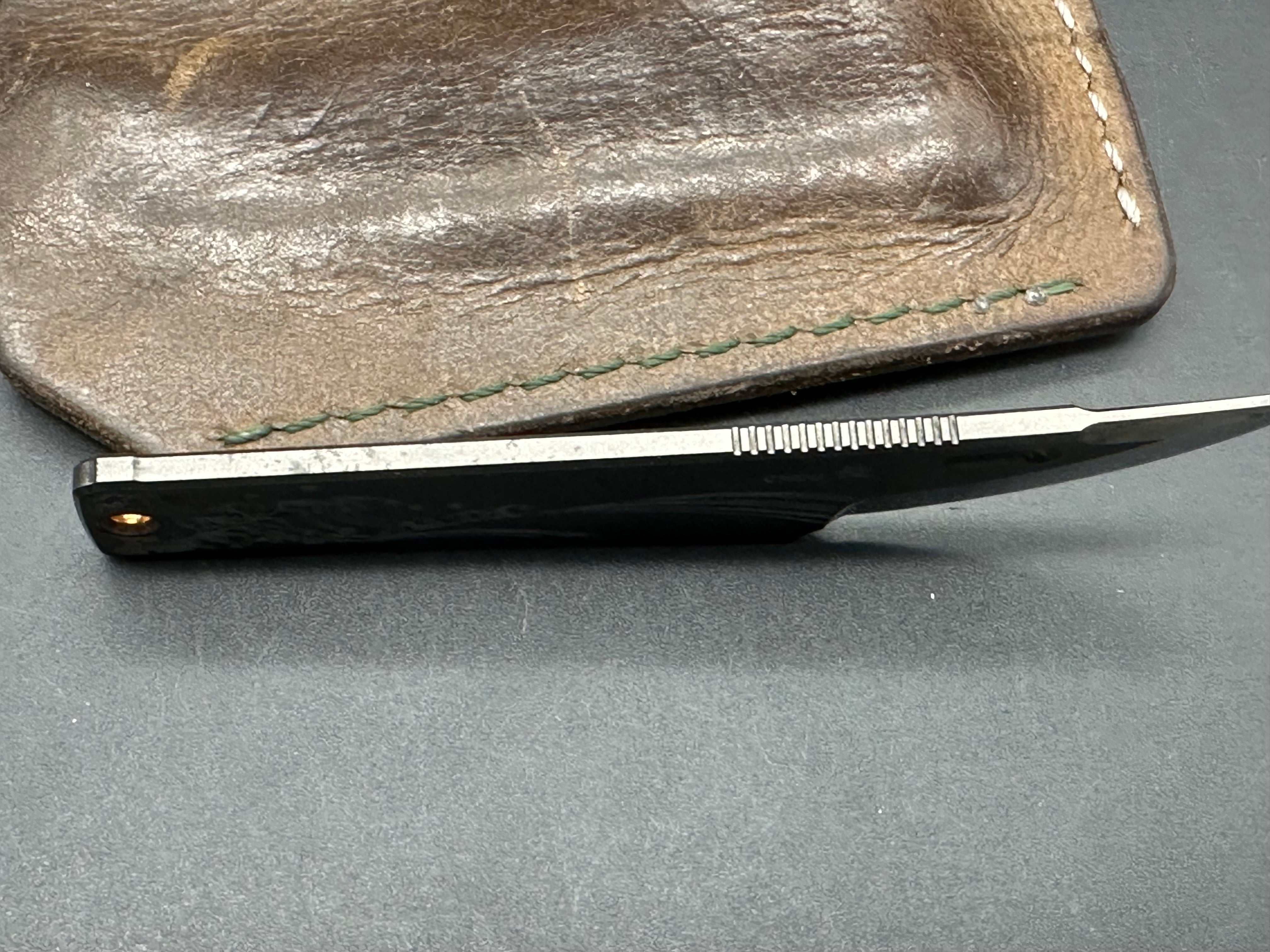Rockstead Chou knife YXR-7 blade material that is DLC coated