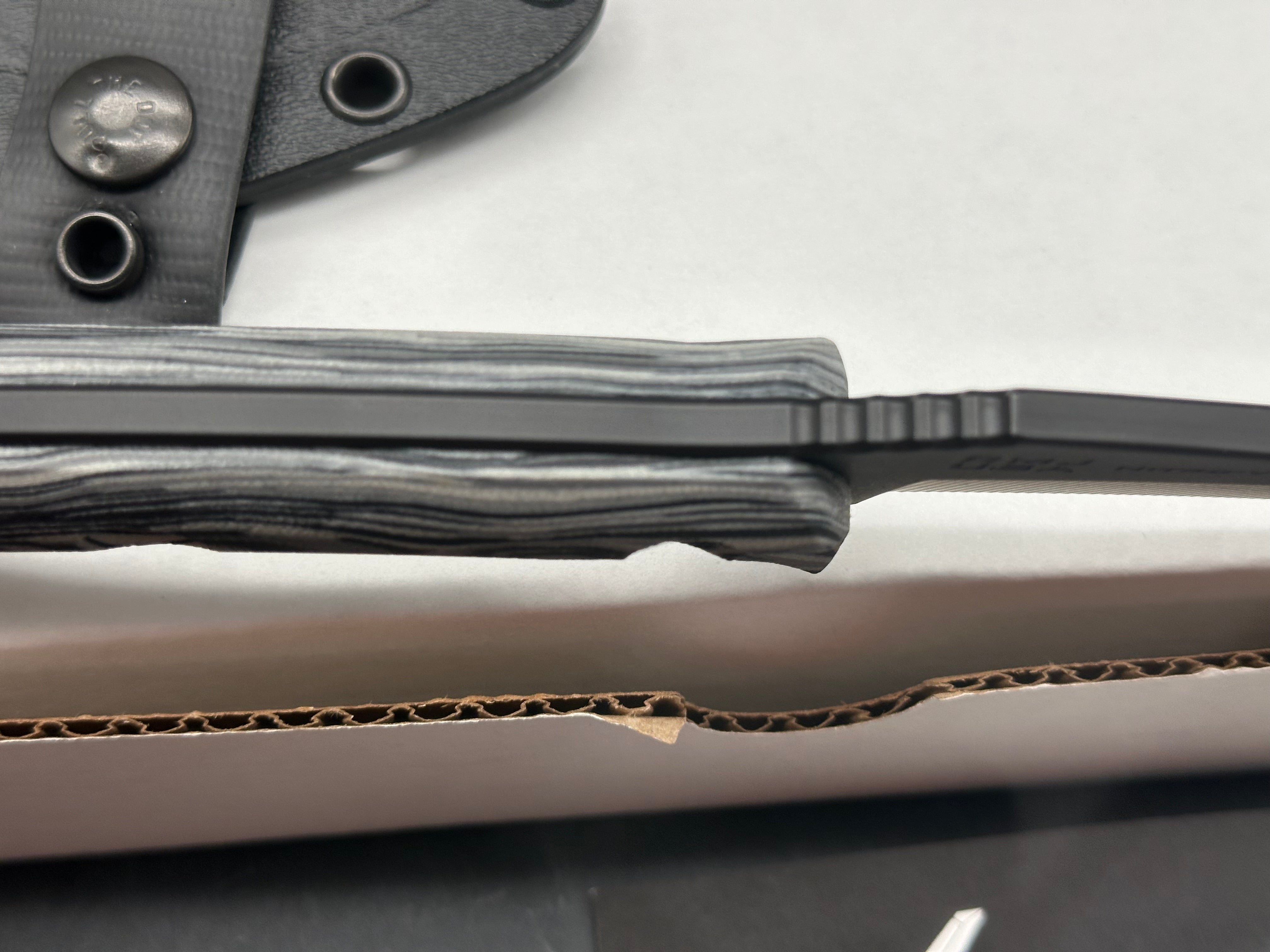 RMJ Tactical Peregrine DLT Exclusive with Urban Camo handles. Black Nitro-V blade